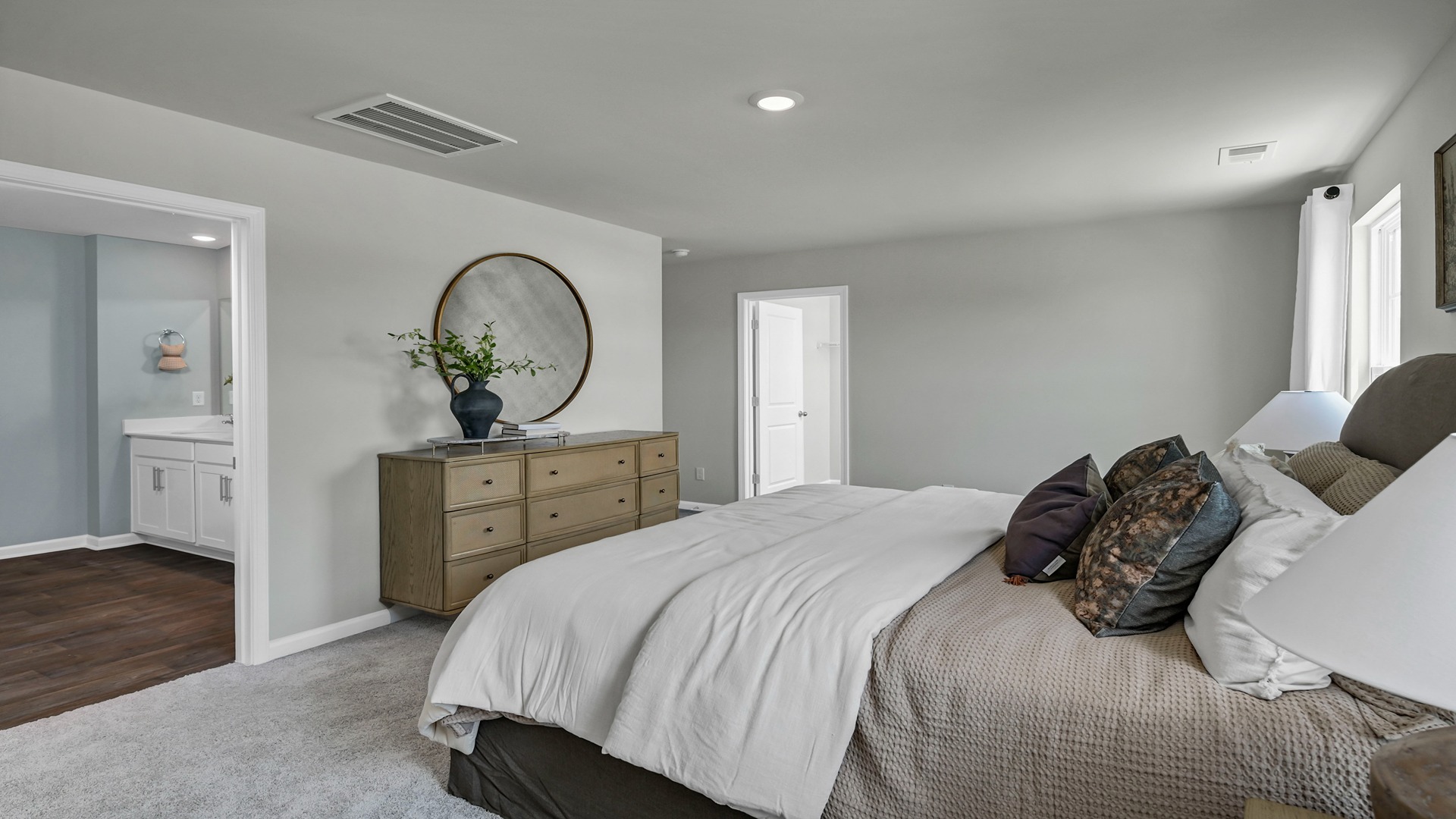 Access to en-suite primary closet and bathroom from the bedroom