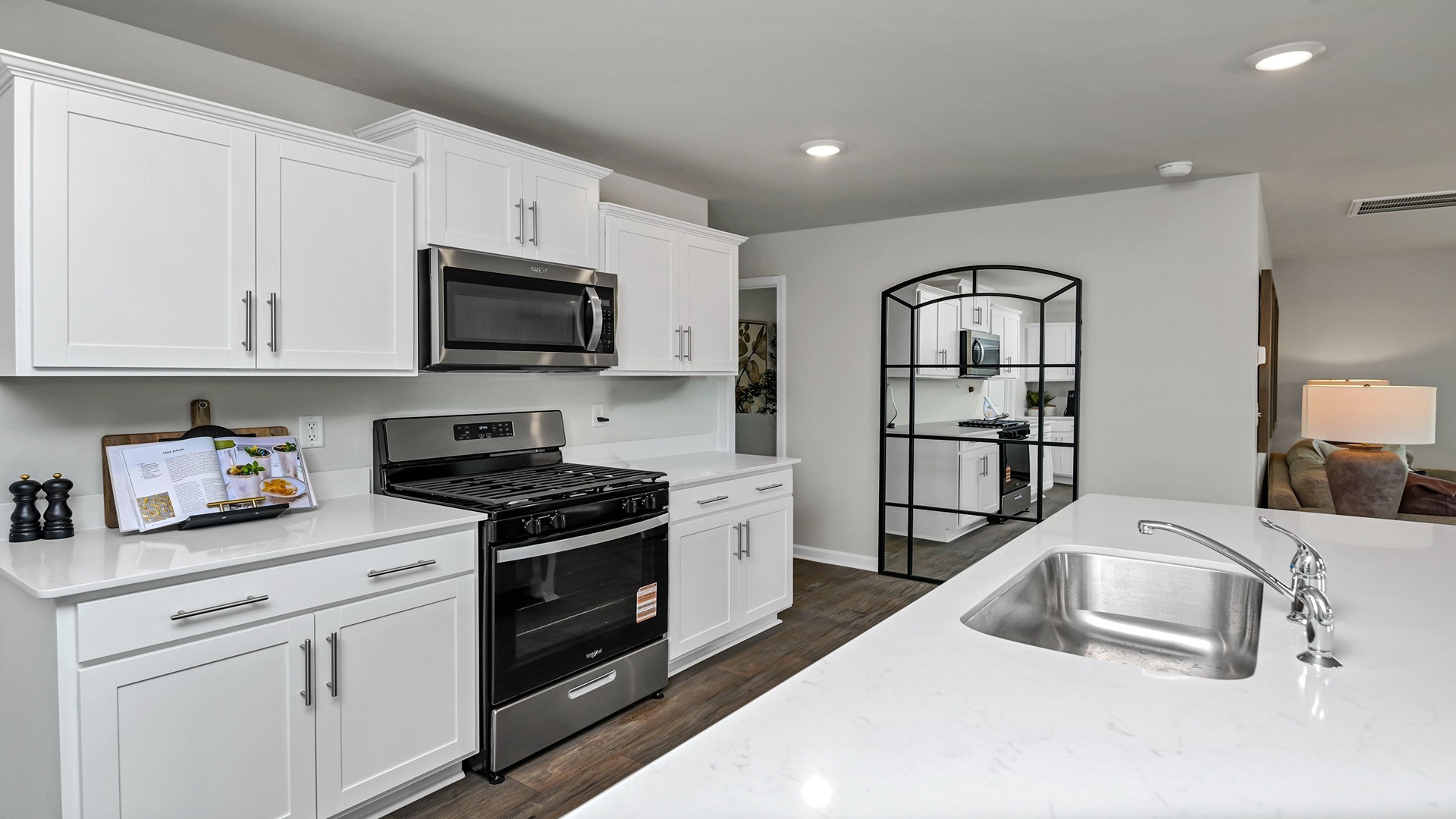 Stainless-steel appliances come in kitchen of home for sale in Ferry Grove