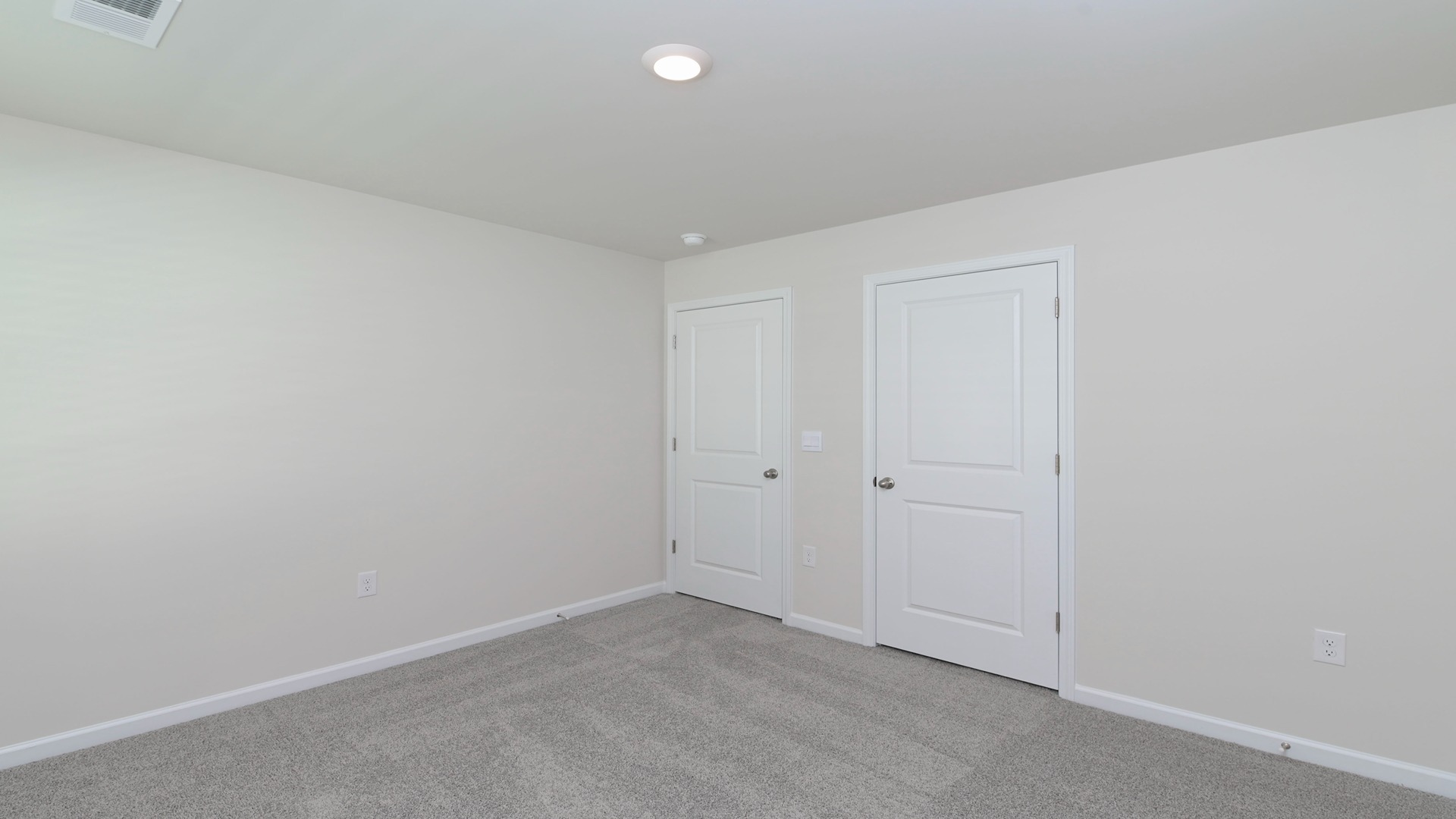 Bedroom 3 upstairs with carpet flooring