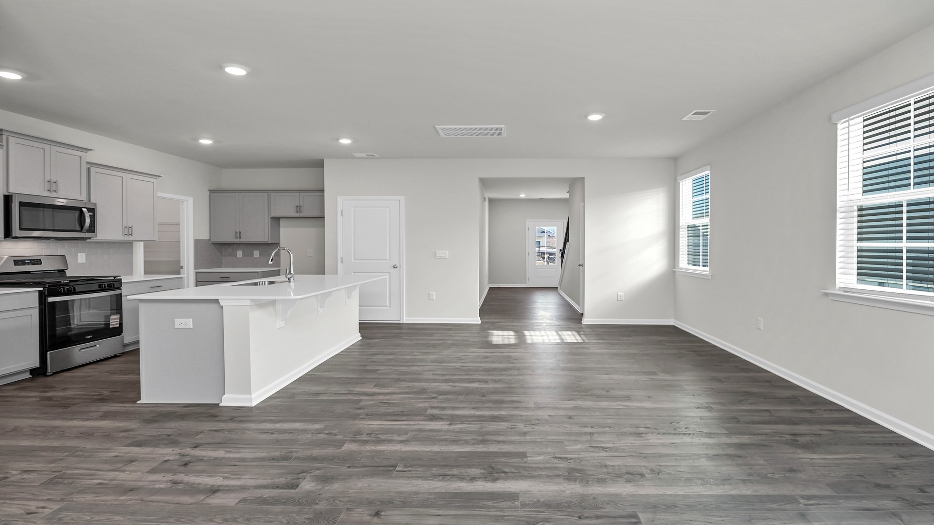 Front foyer opens up into dining/kitchen area