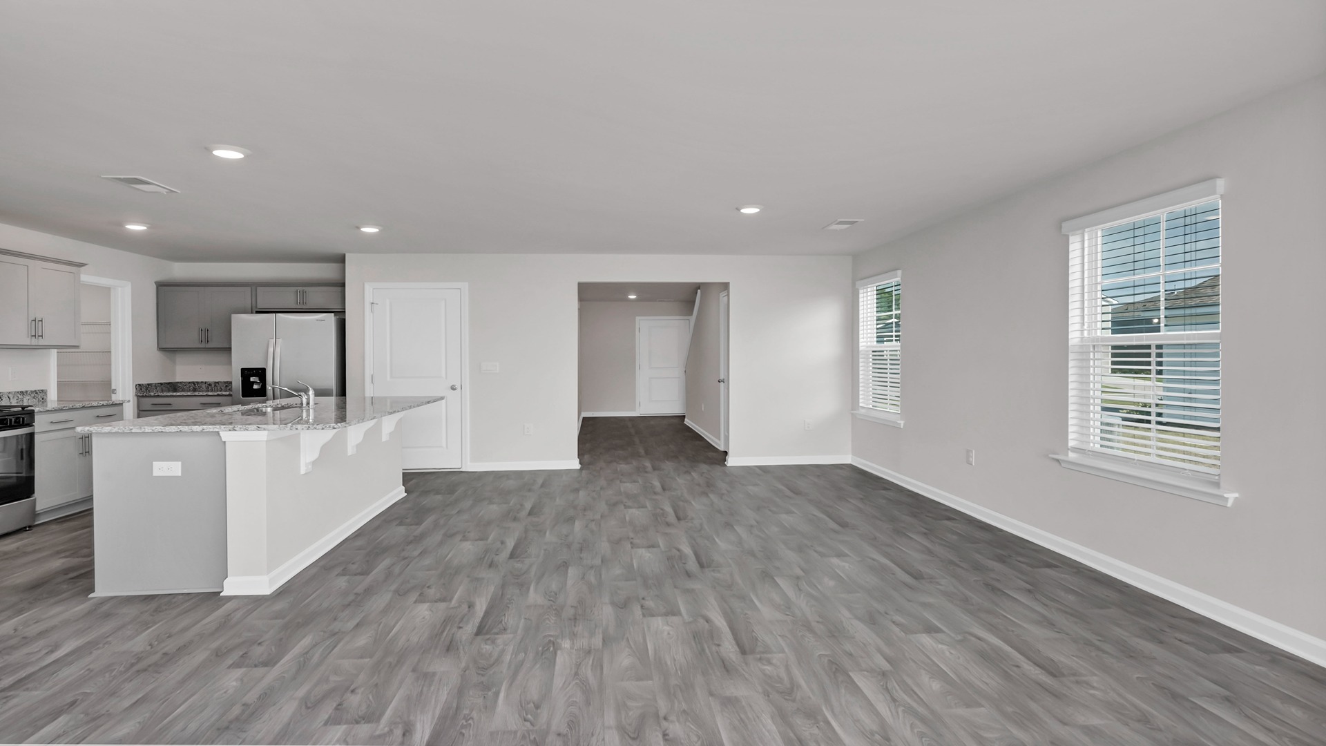 There is natural light in the dining area from several windows