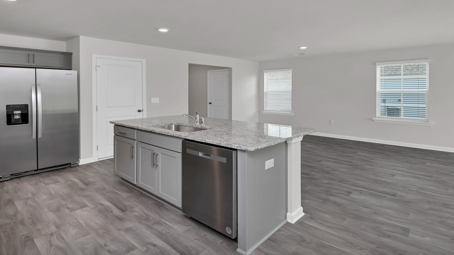 Floating island overlooks the dining and living areas