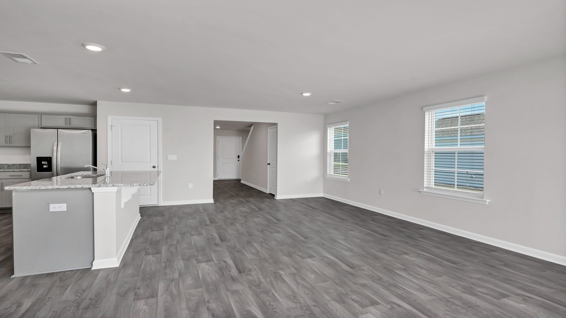 There is natural light in the dining area from several windows