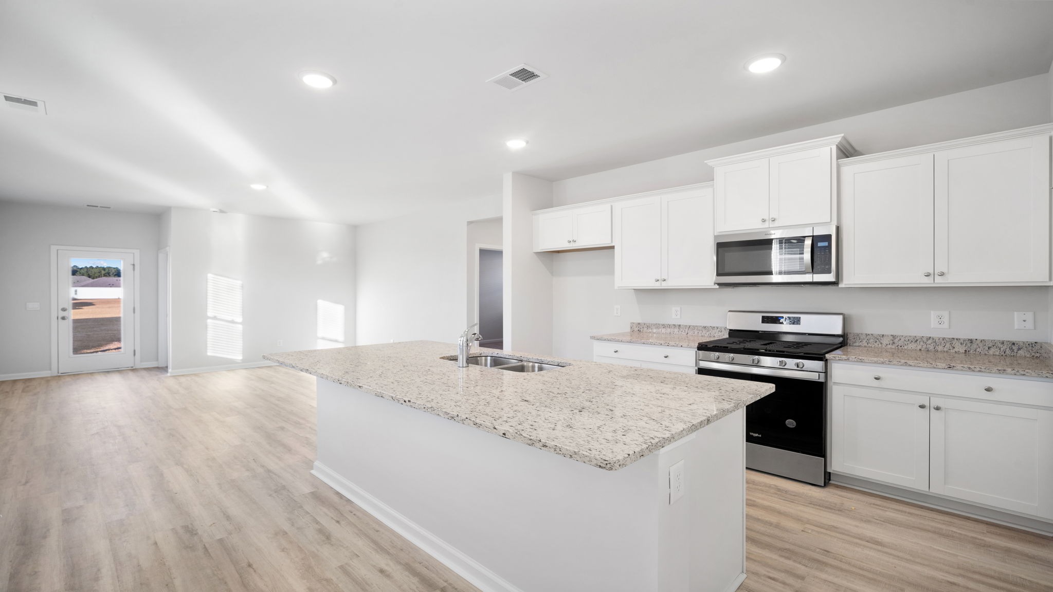 Front foyer opens up into kitchen space