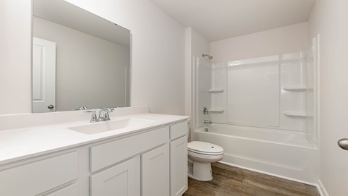 The full bathroom is located between bedroom 2 and 3 upstairs.