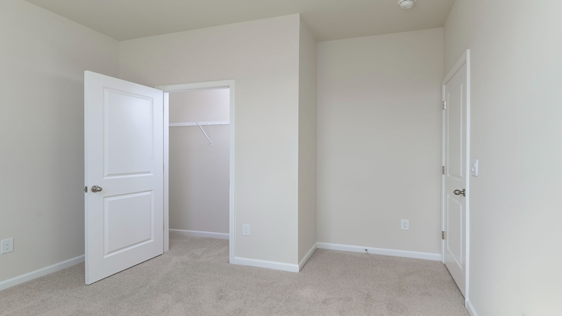 Private closet and carpet floors in bedroom 3