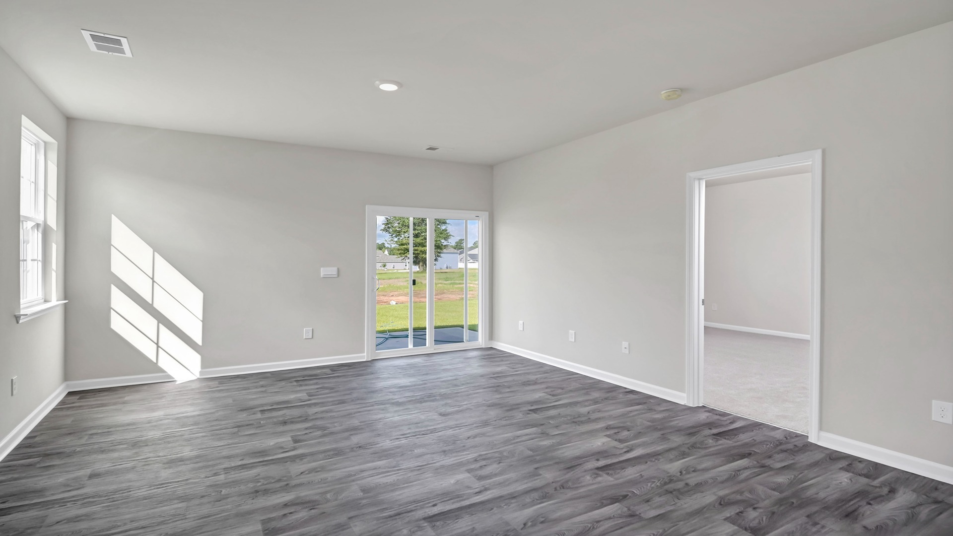 Access to the Cameron primary suite off the dining/living areas