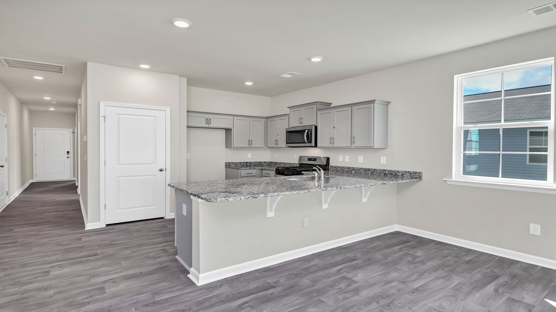 Front foyer opens up into the Cameron kitchen and main living areas
