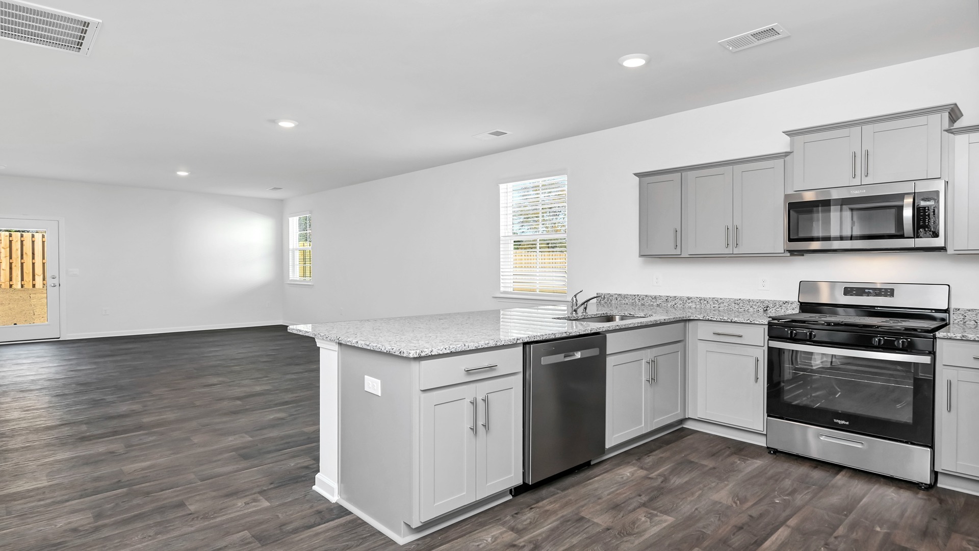 The living and dining areas are open concept.