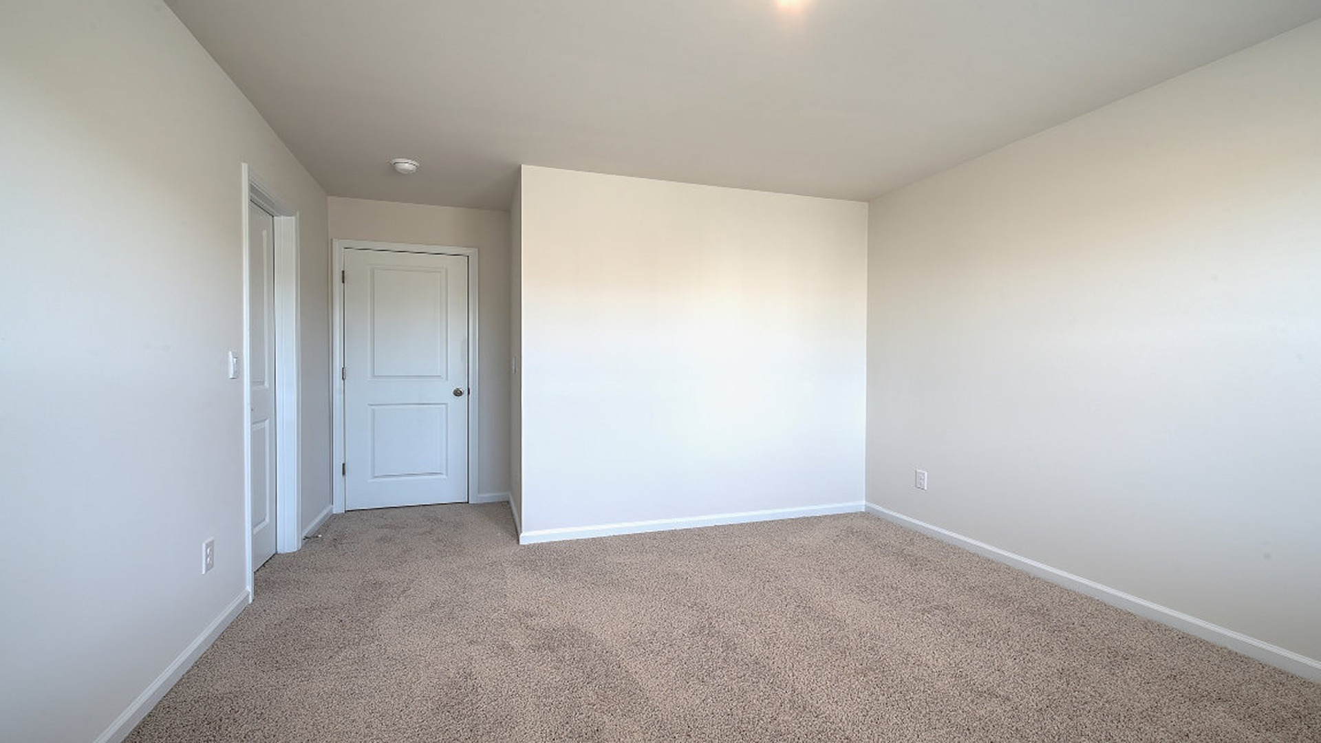 Carpet flooring and private closet in bedroom 3