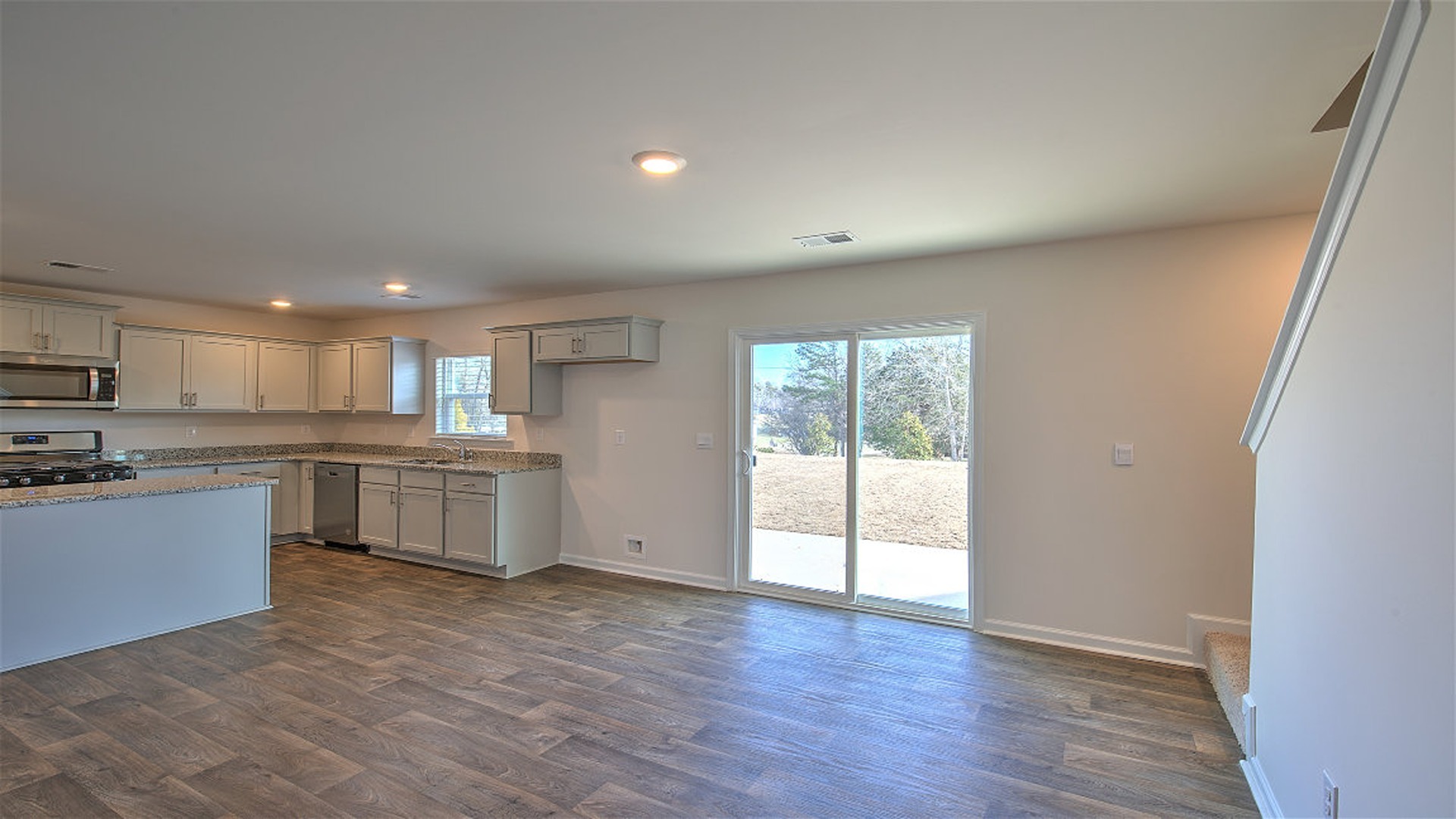 Access to back patio in dining area through back sliding doors