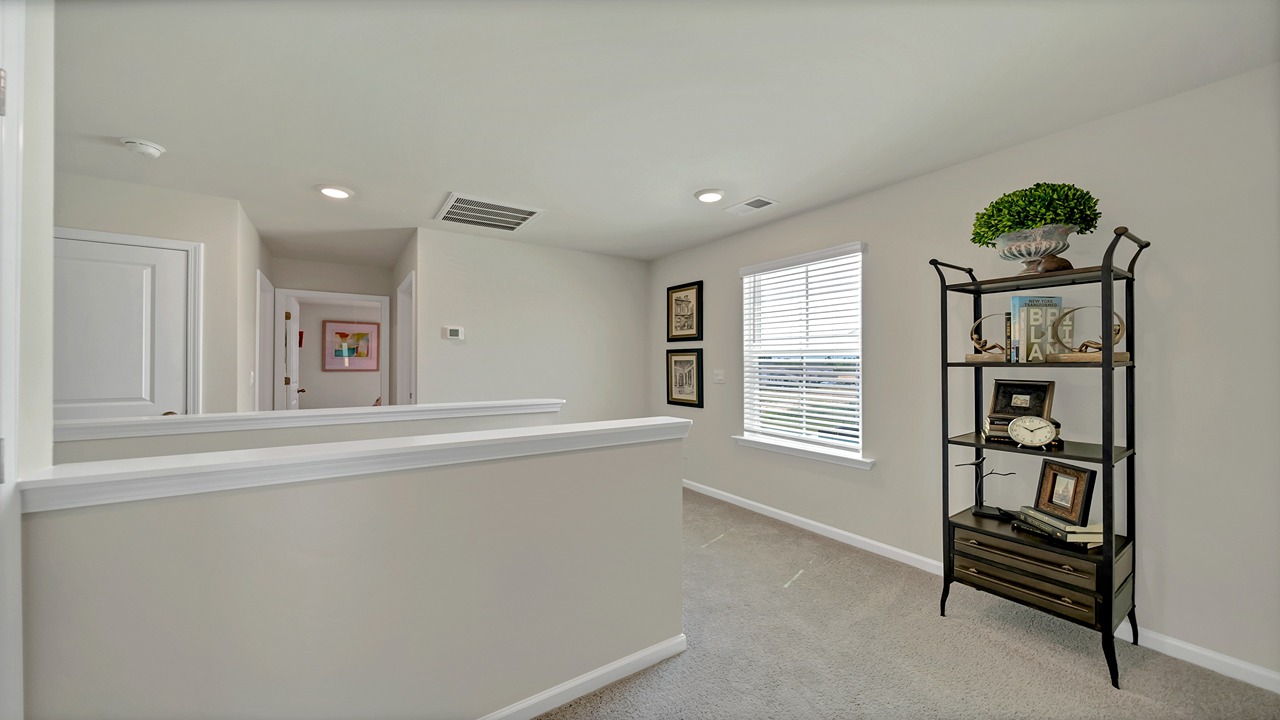 Small loft space at the top of the stairs