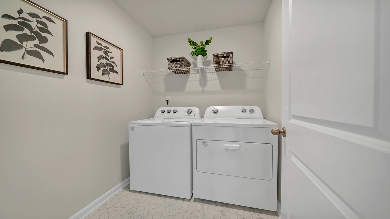 Laundry room conveniently located upstairs with bedrooms