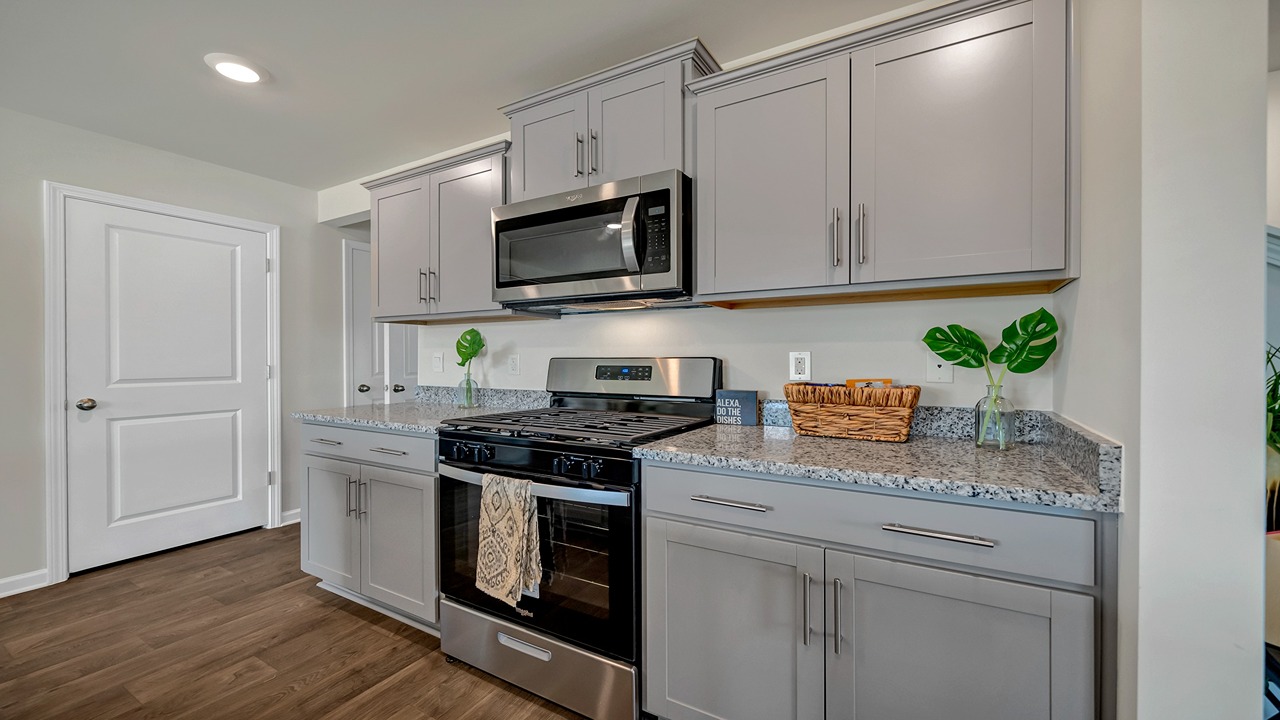 Microwave mounted above stove