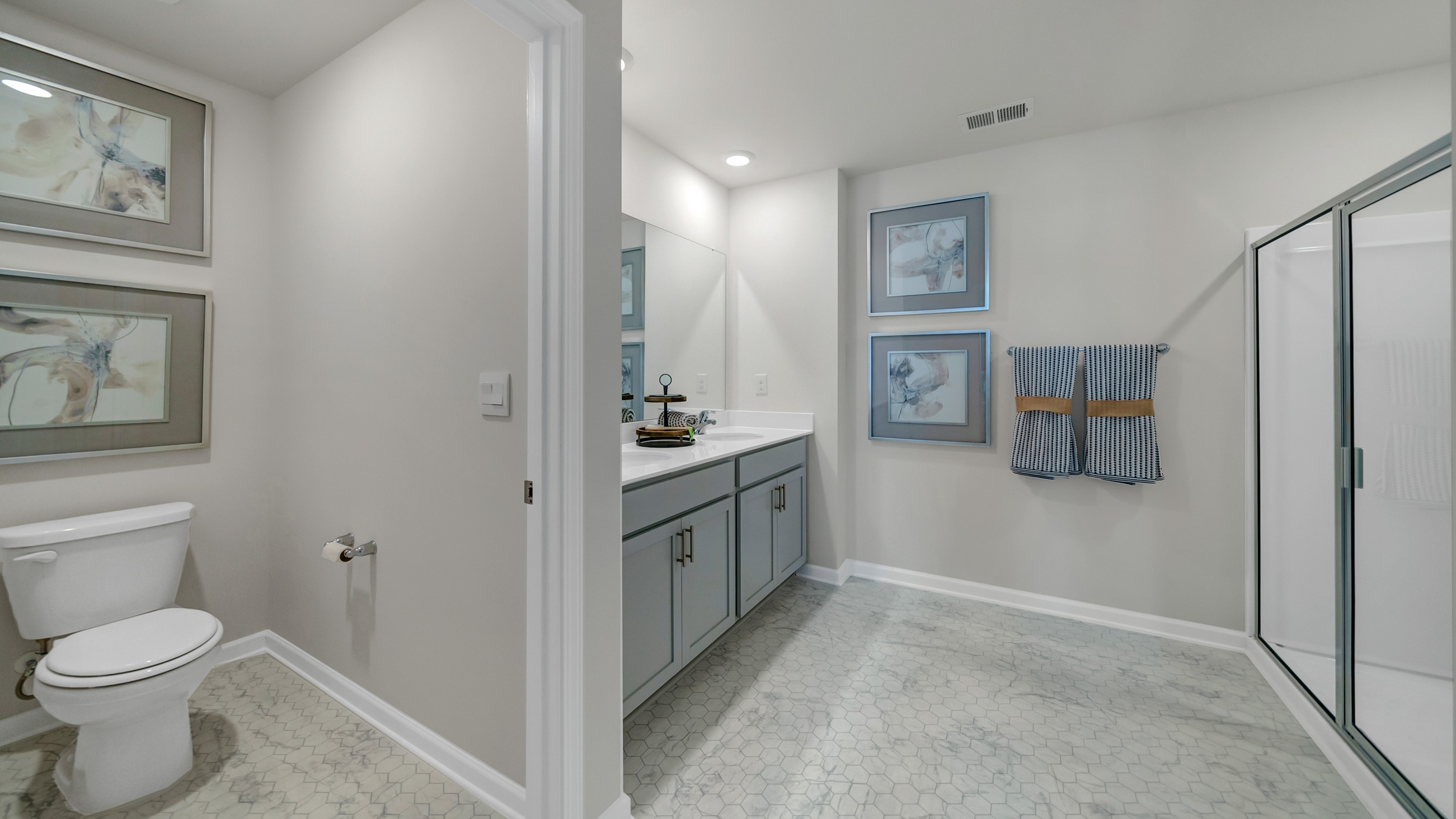 En-suite primary bathroom in new construction home in Hopkins