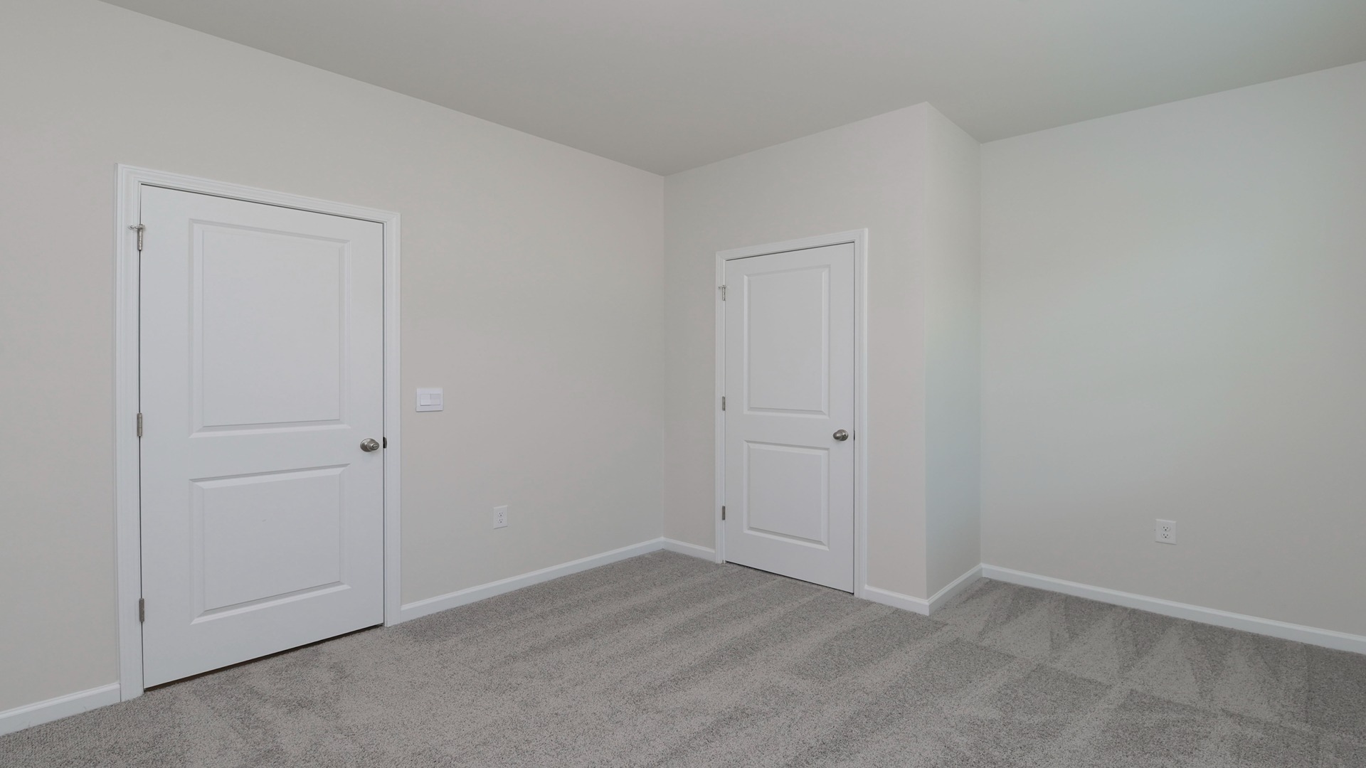 Downstairs bedroom in two-story home for sale in Hunter's Branch