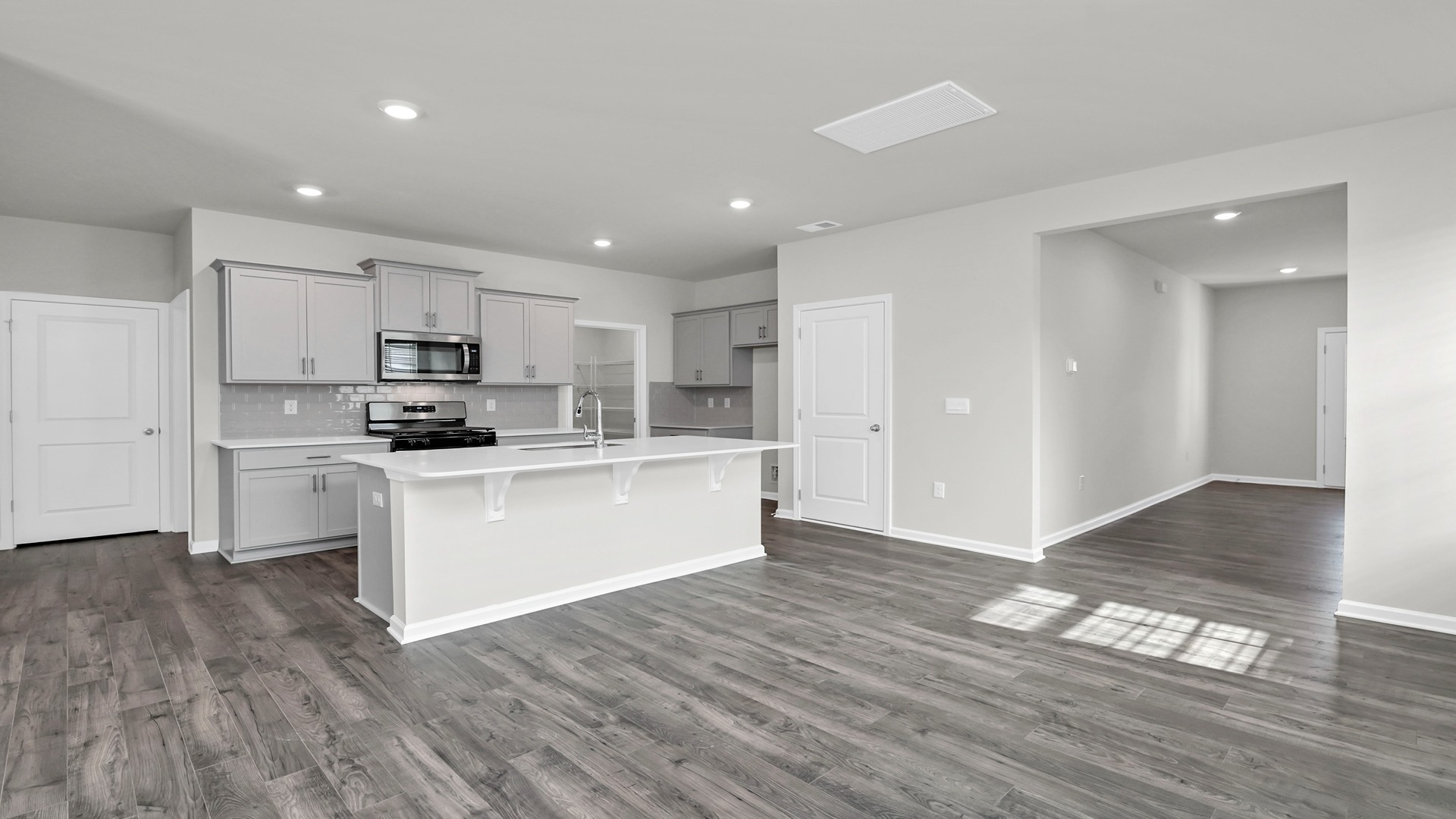 Front foyer of the home opens up into a spacious kitchen and dining area