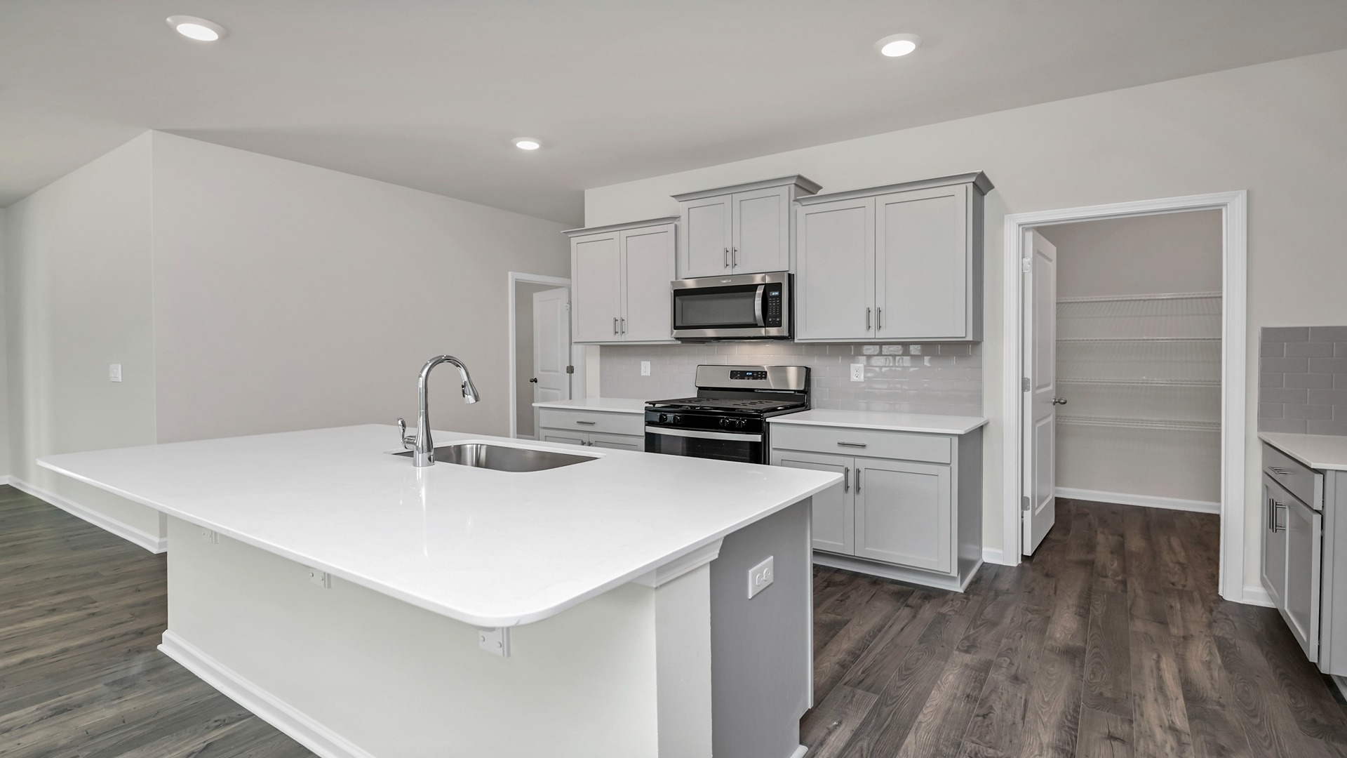 Spacious walk-in pantry in the modern, new kitchen