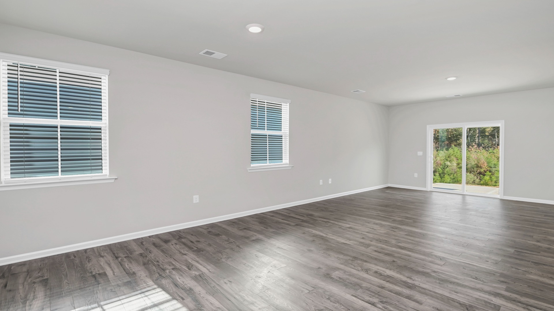Lots of natural light in the open concept dining and living areas of the Robie floorplan for sale