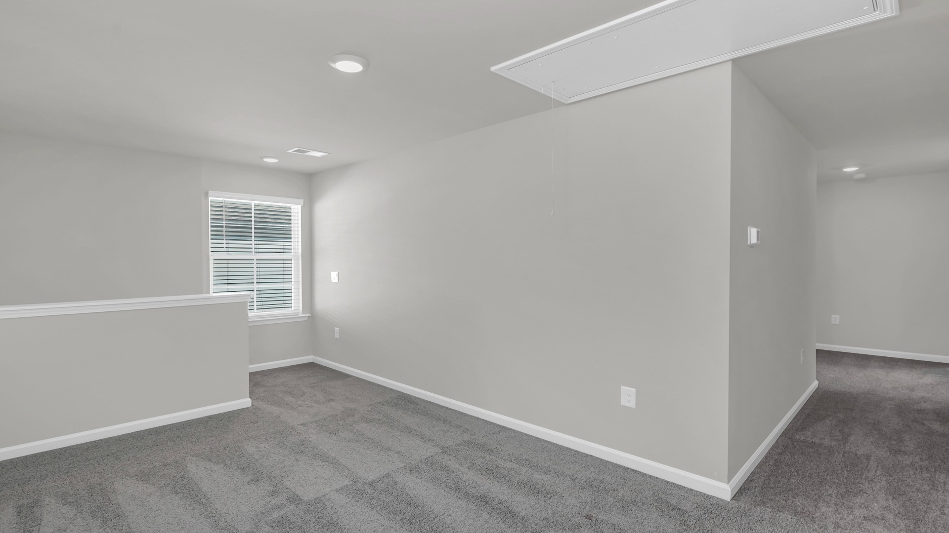 Back through upstairs hall to get to other bedrooms and bathroom