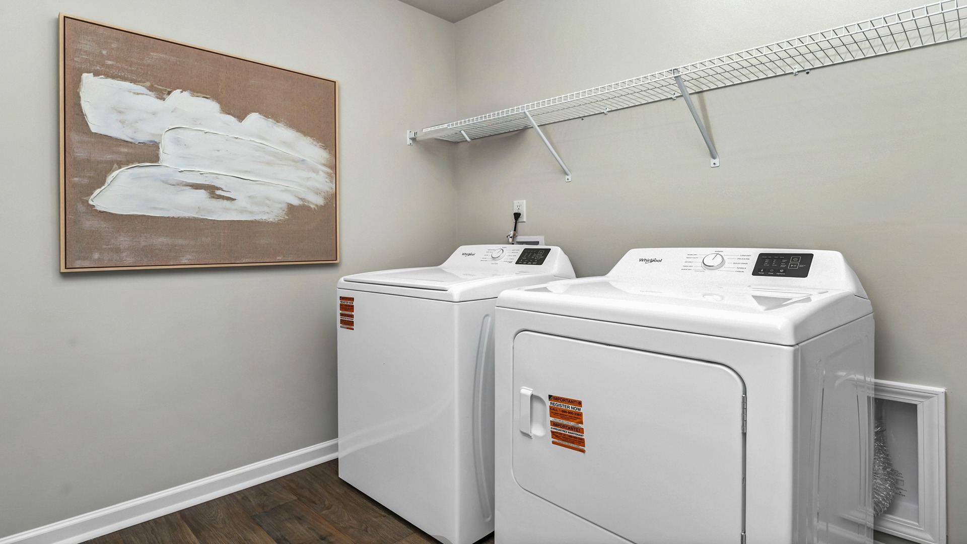 Laundry room upstairs with wire shelving