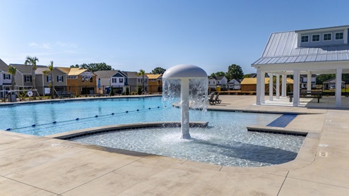 Kid's shallow area of the pool with a fountain.