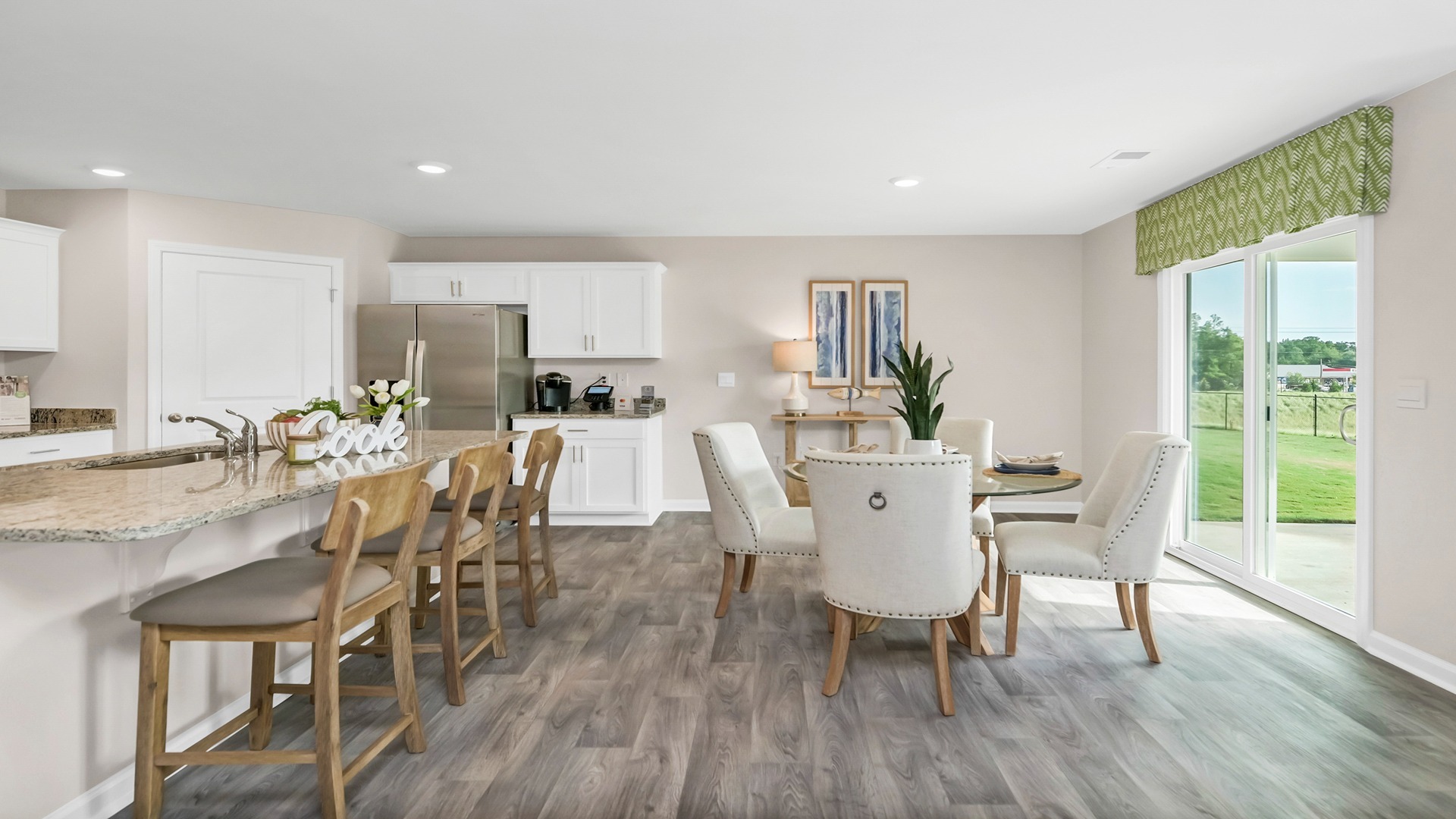 Furnished kitchen and dining areas