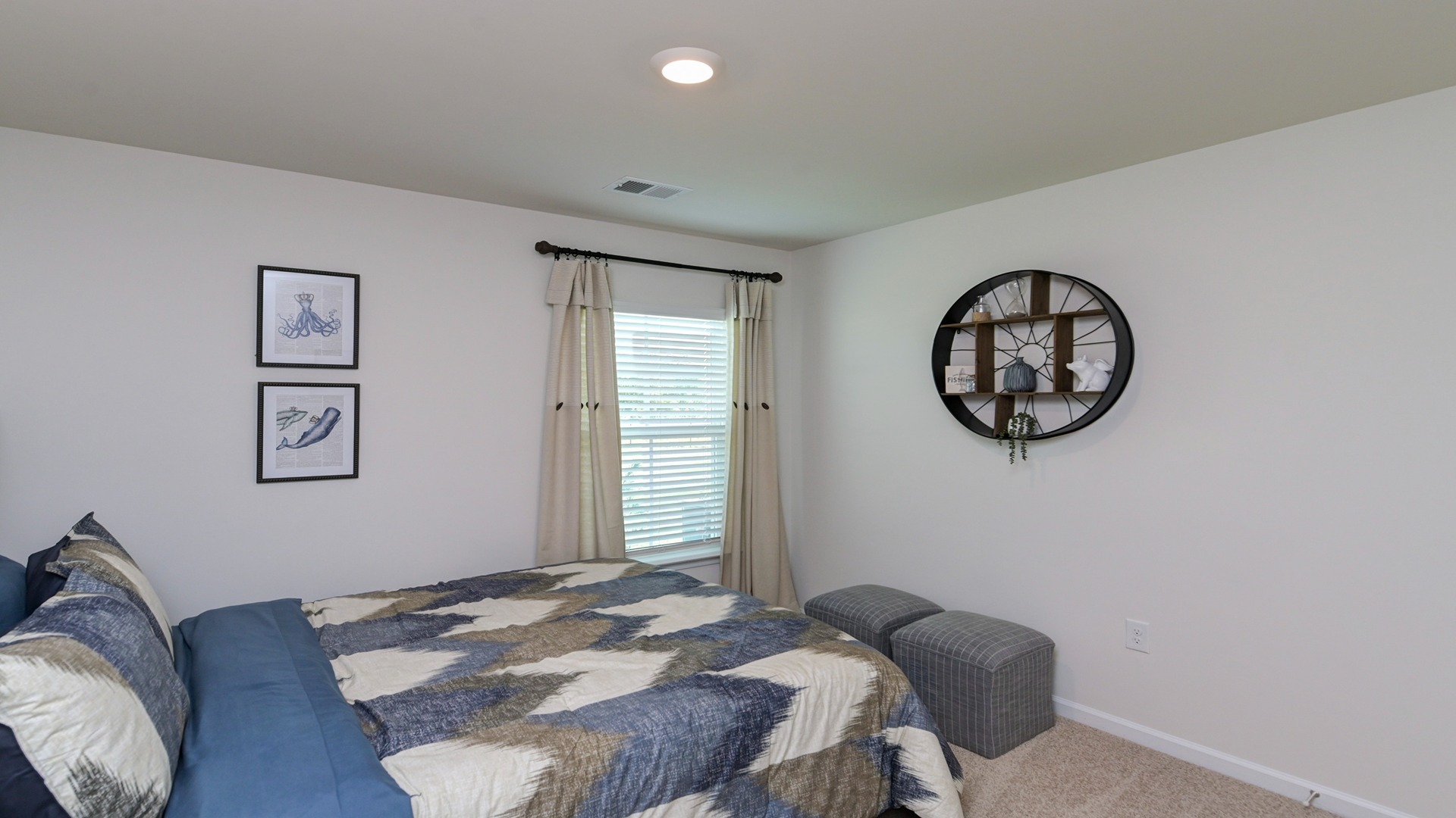 Bedroom 3 with carpet flooring and a window for light