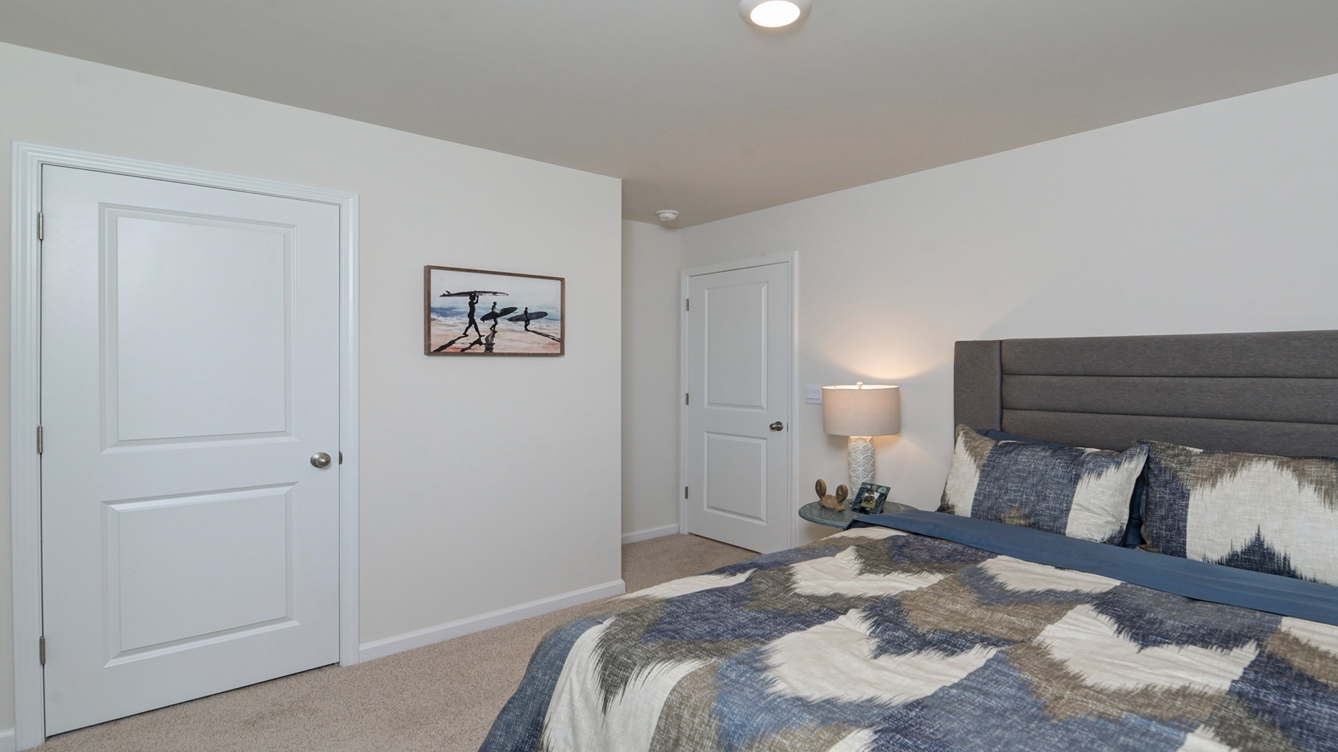 Bedroom 3 with carpet flooring and a window for light