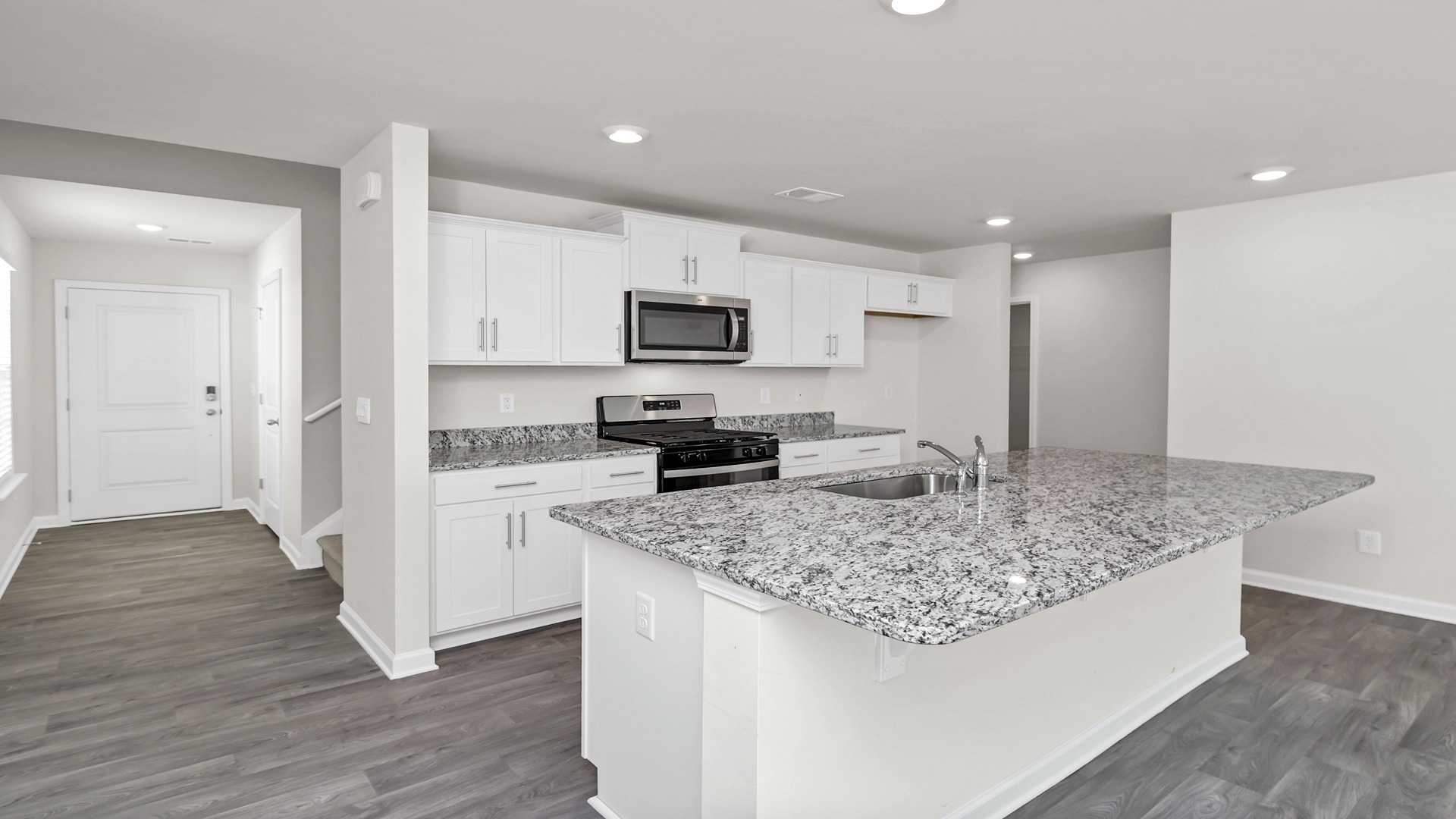 Front foyer opens up into kitchen area