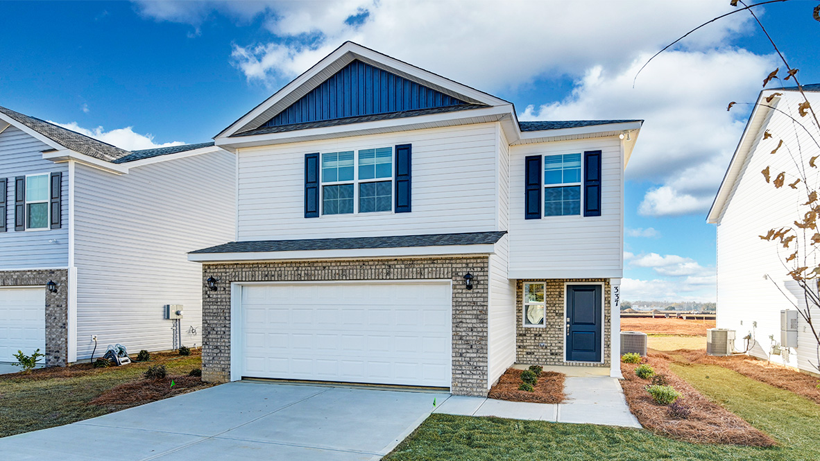 The Manning features a 2-car garage and covered front entry