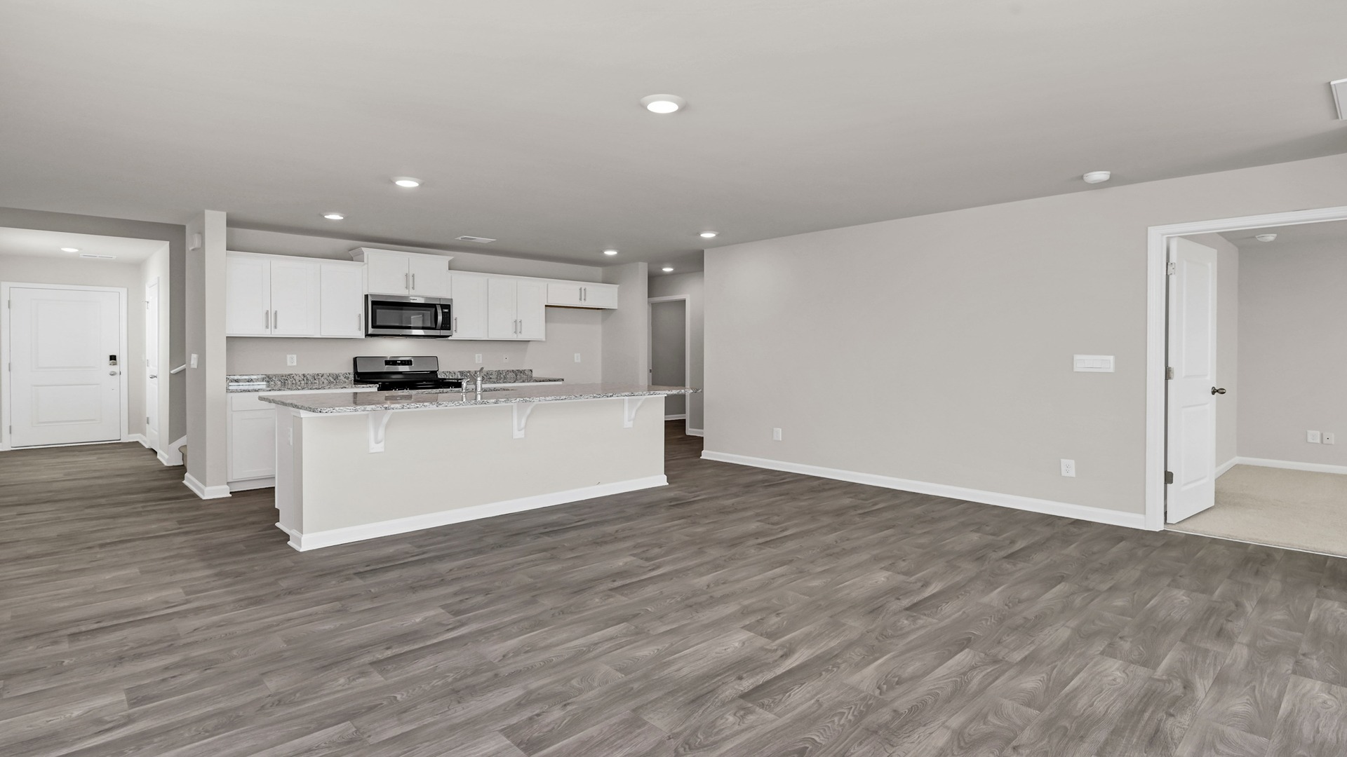 Access to primary suite off the dining/living area