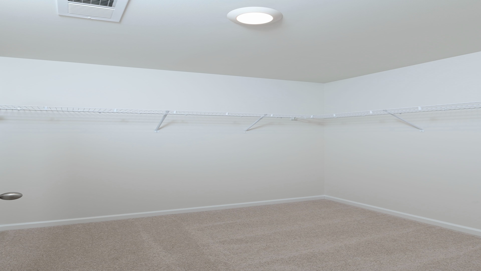 Spacious walk-in primary closet in the Manning floor plan in Hunter's Branch