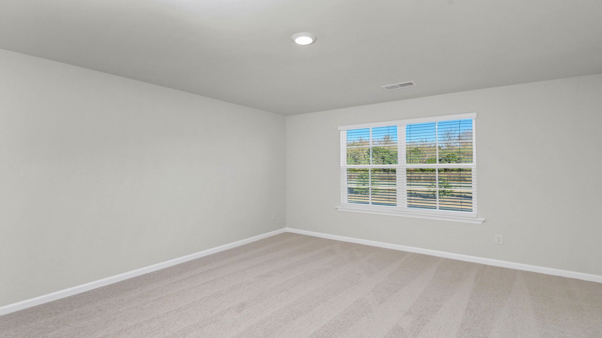 First-floor primary bedroom in new home for sale in Hunter's Branch