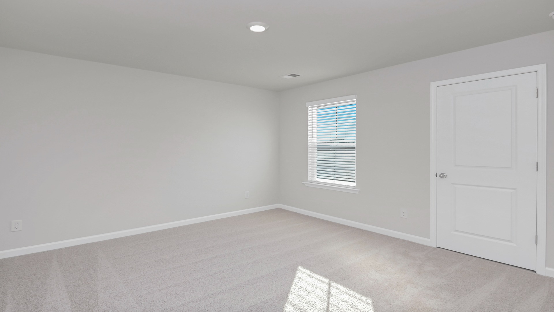 Bedroom 4 upstairs with a walk-in private closet and a window for light
