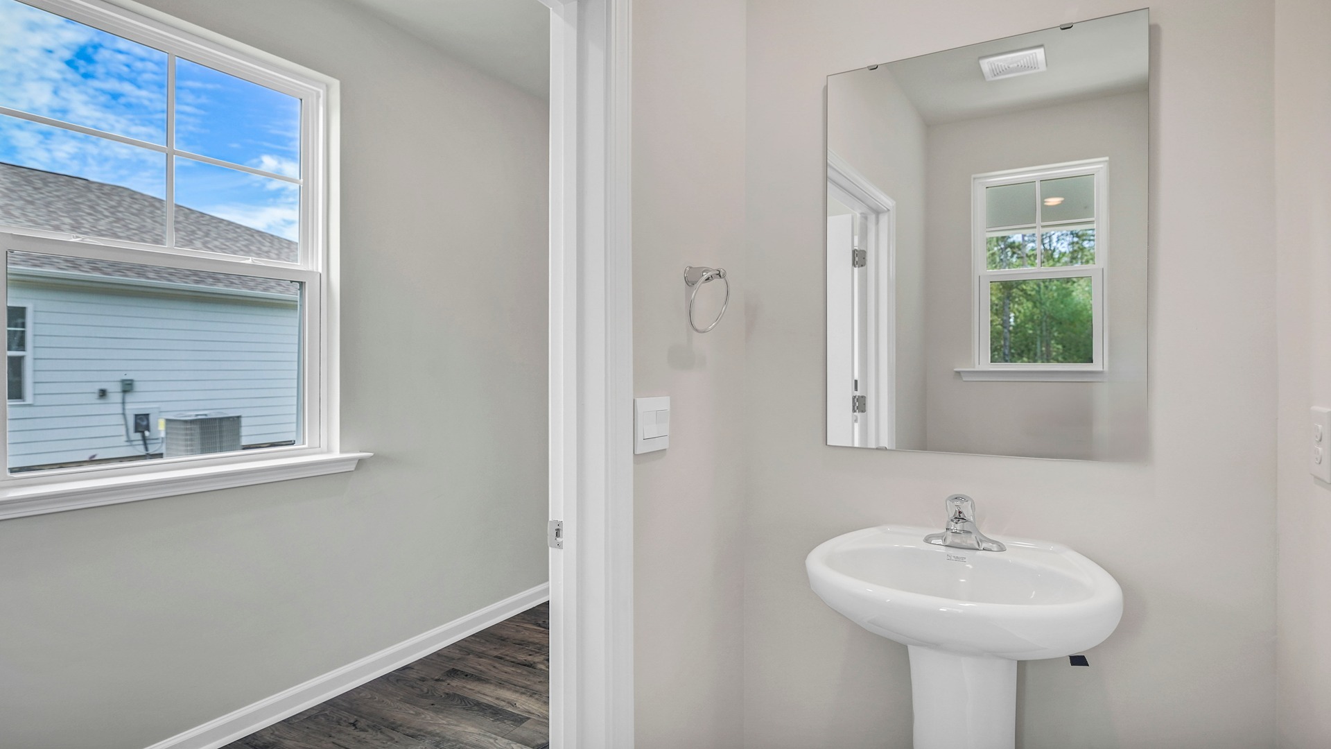 First floor powder room in foyer