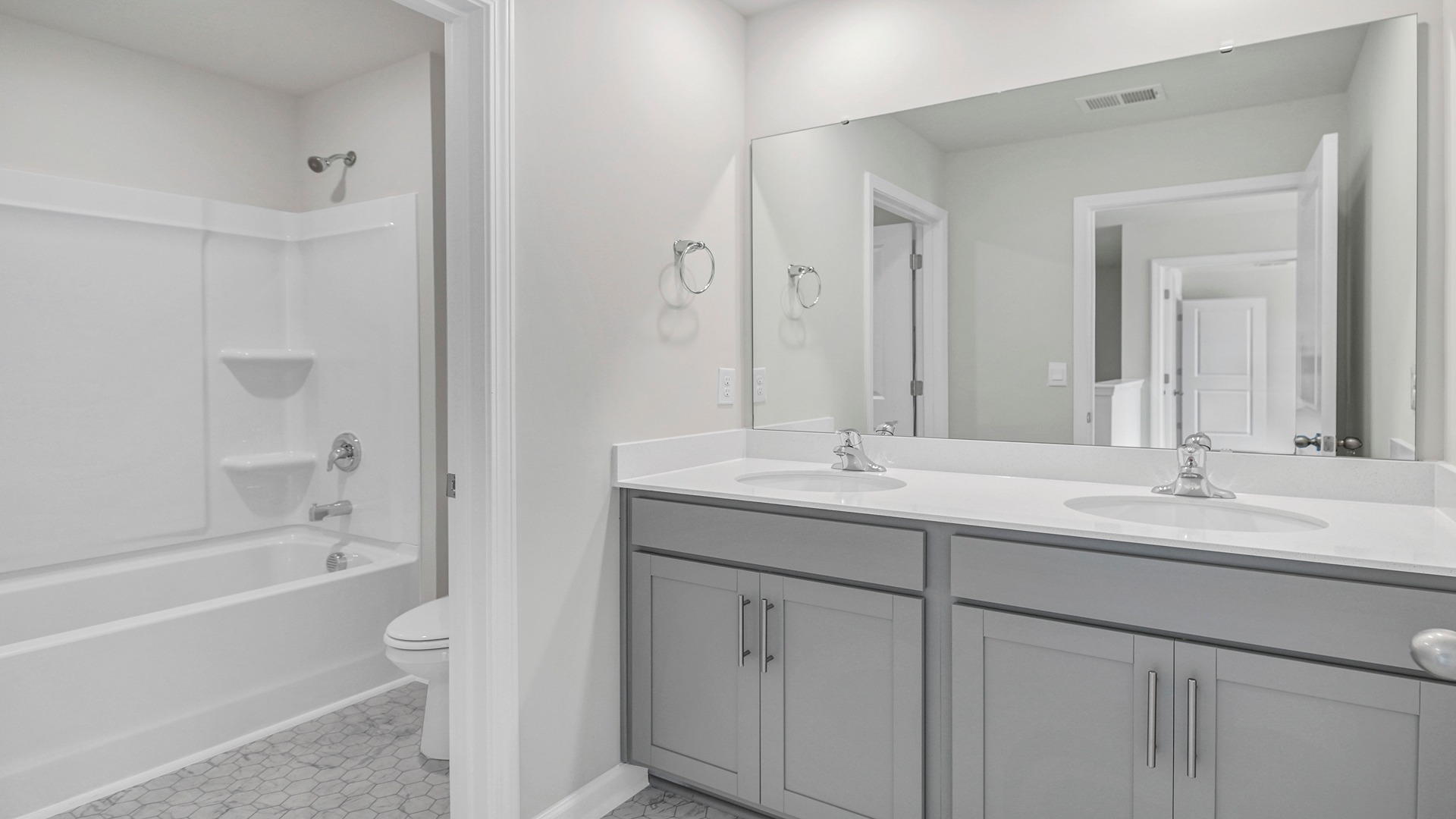 Bathroom 2 upstairs with a double vanity