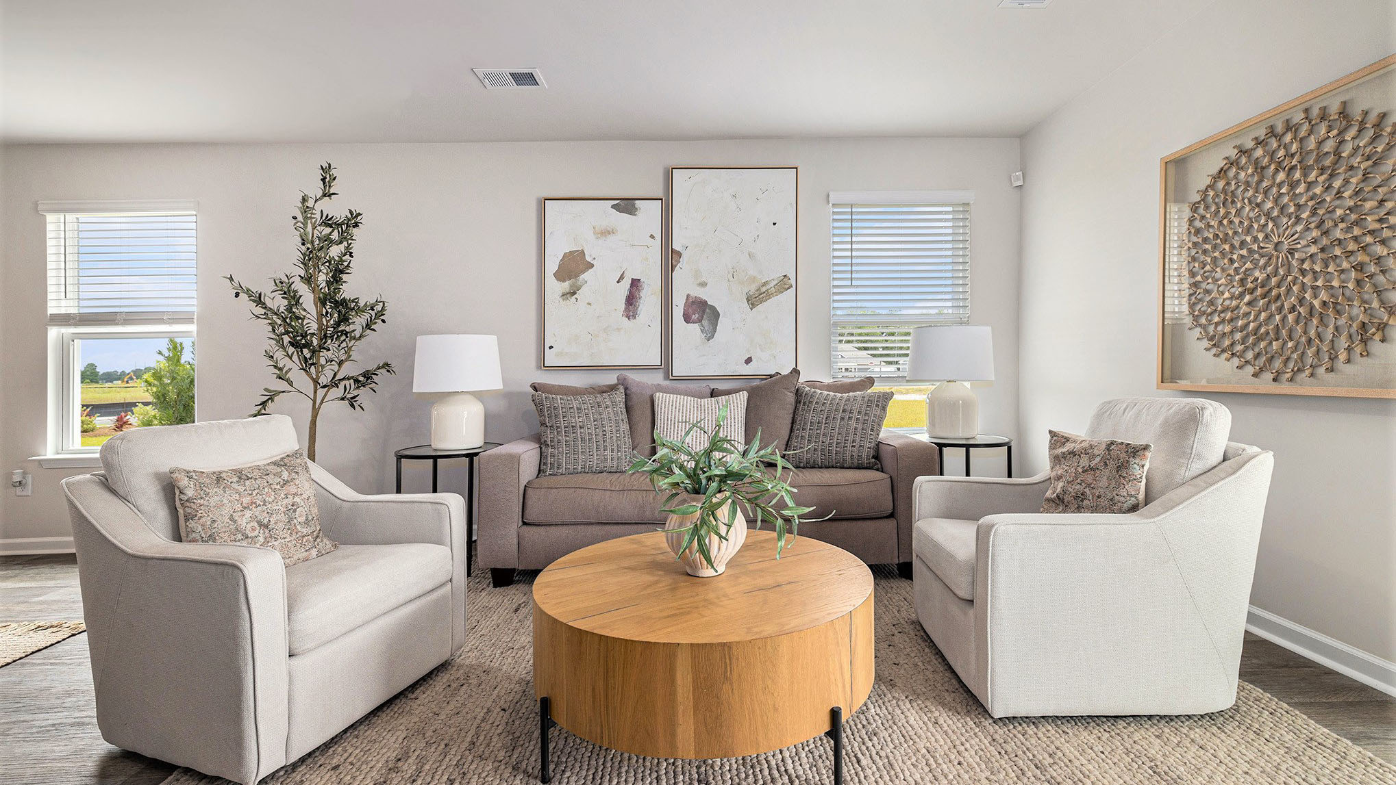 The living area is spacious with vinyl flooring