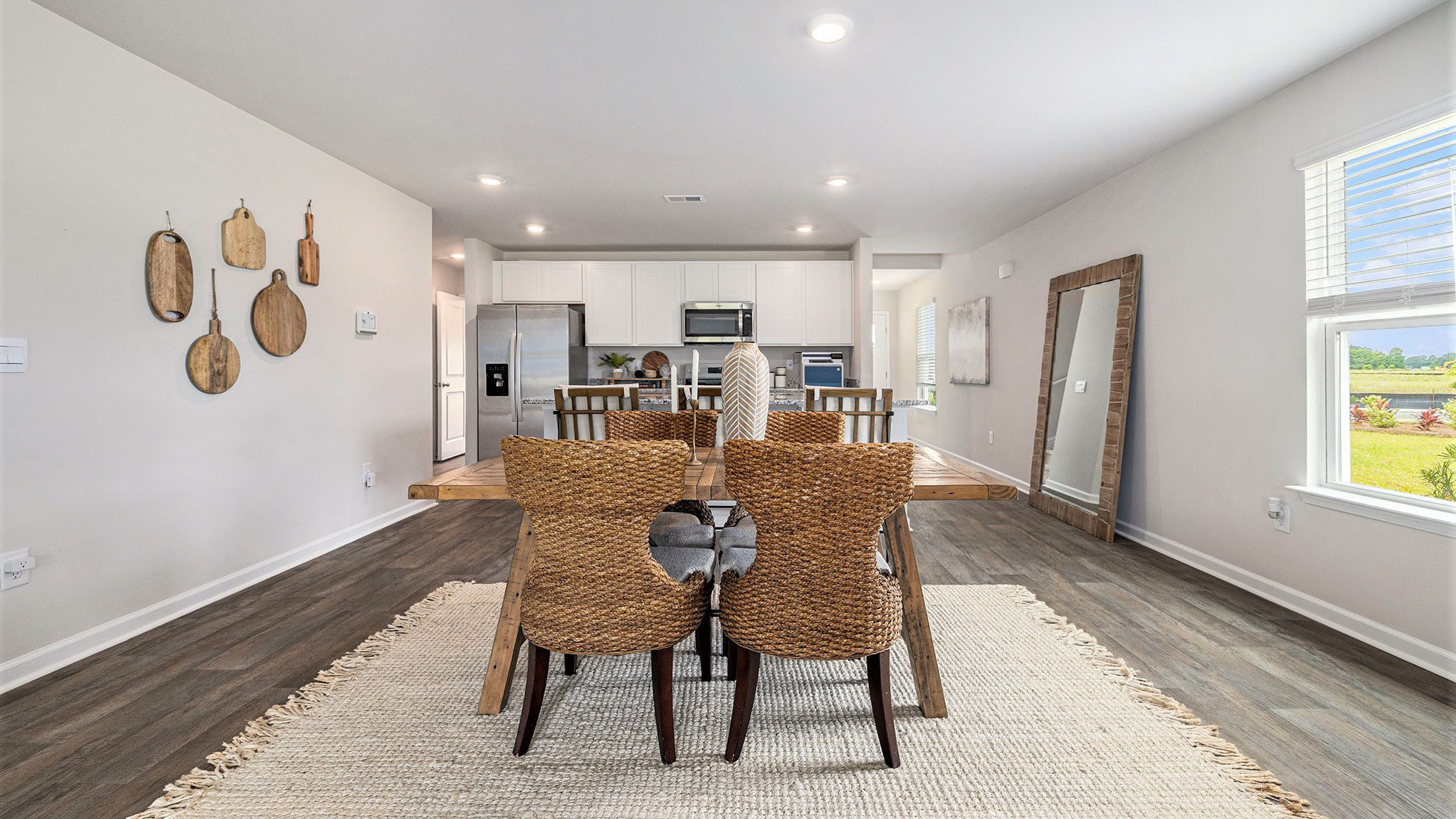 The dining and kitchen areas are open concept