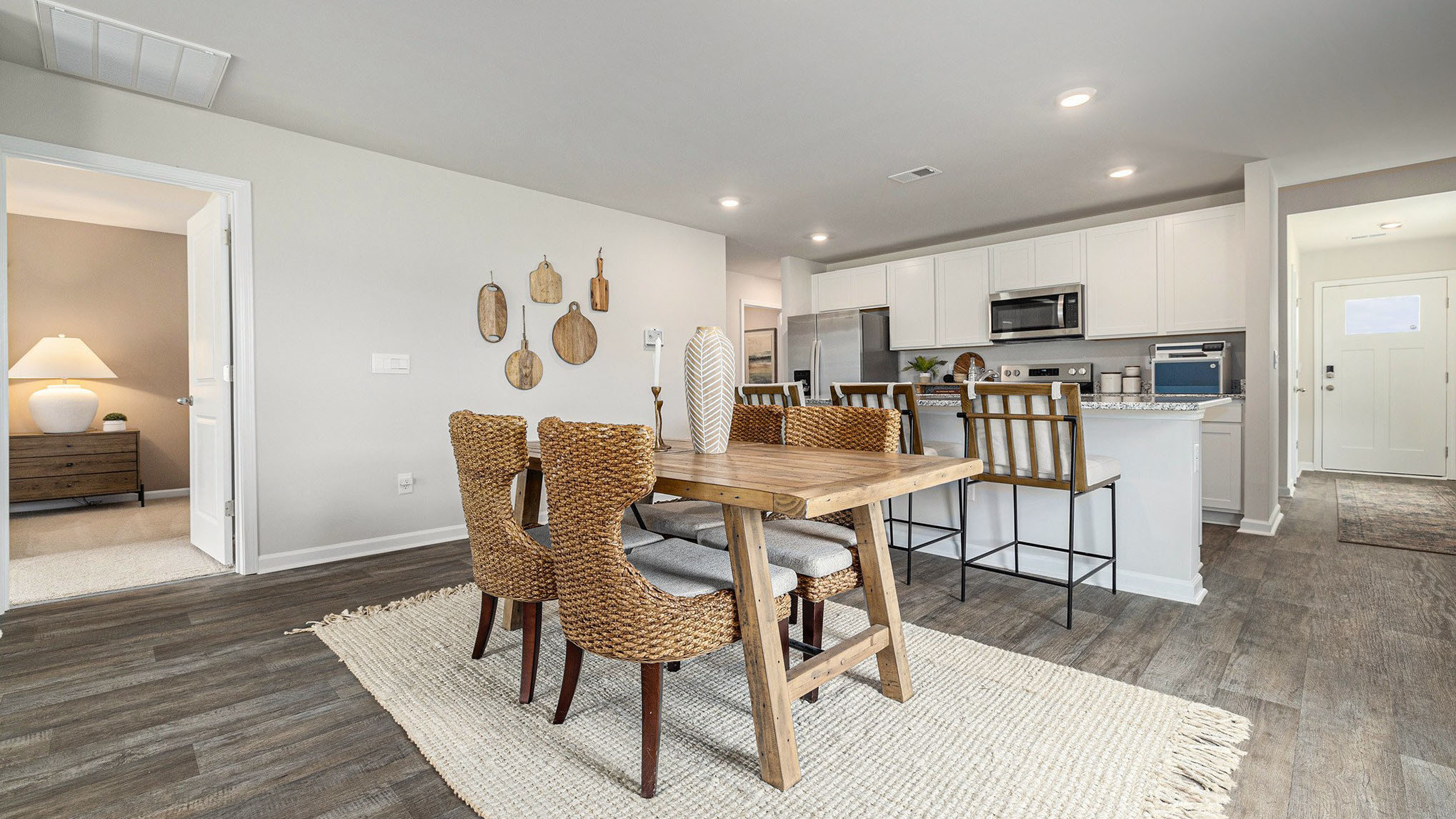 Manning dining and kitchen areas with vinyl flooring