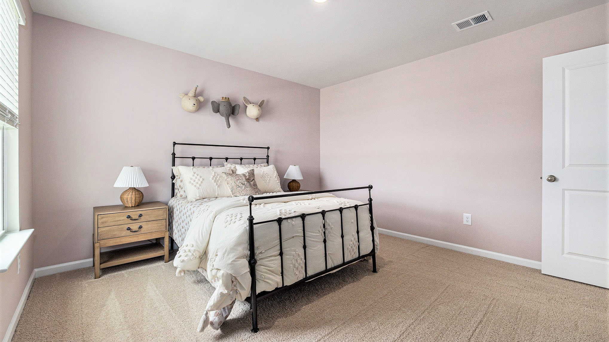 Upstairs bedroom staged as a bedroom/guest suite