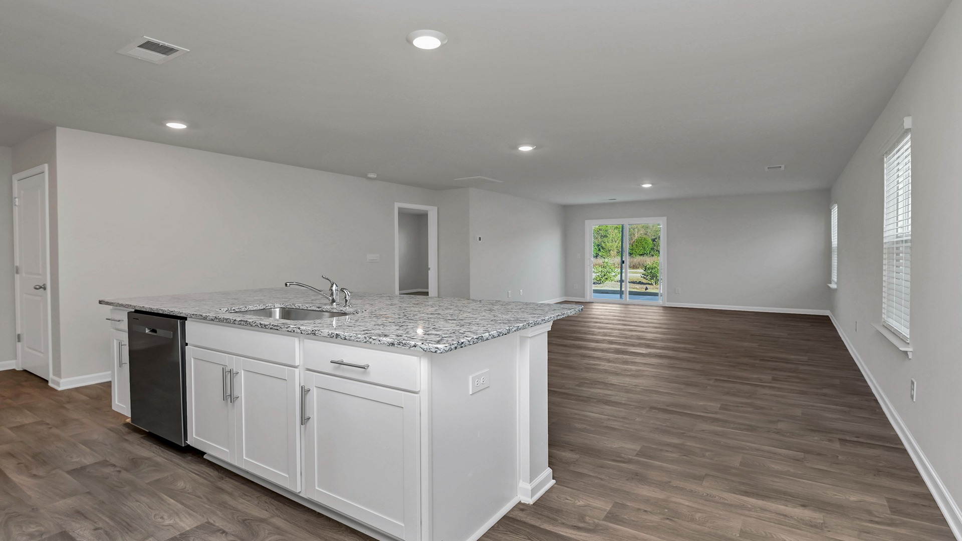 Floating island overlooking dining and living areas