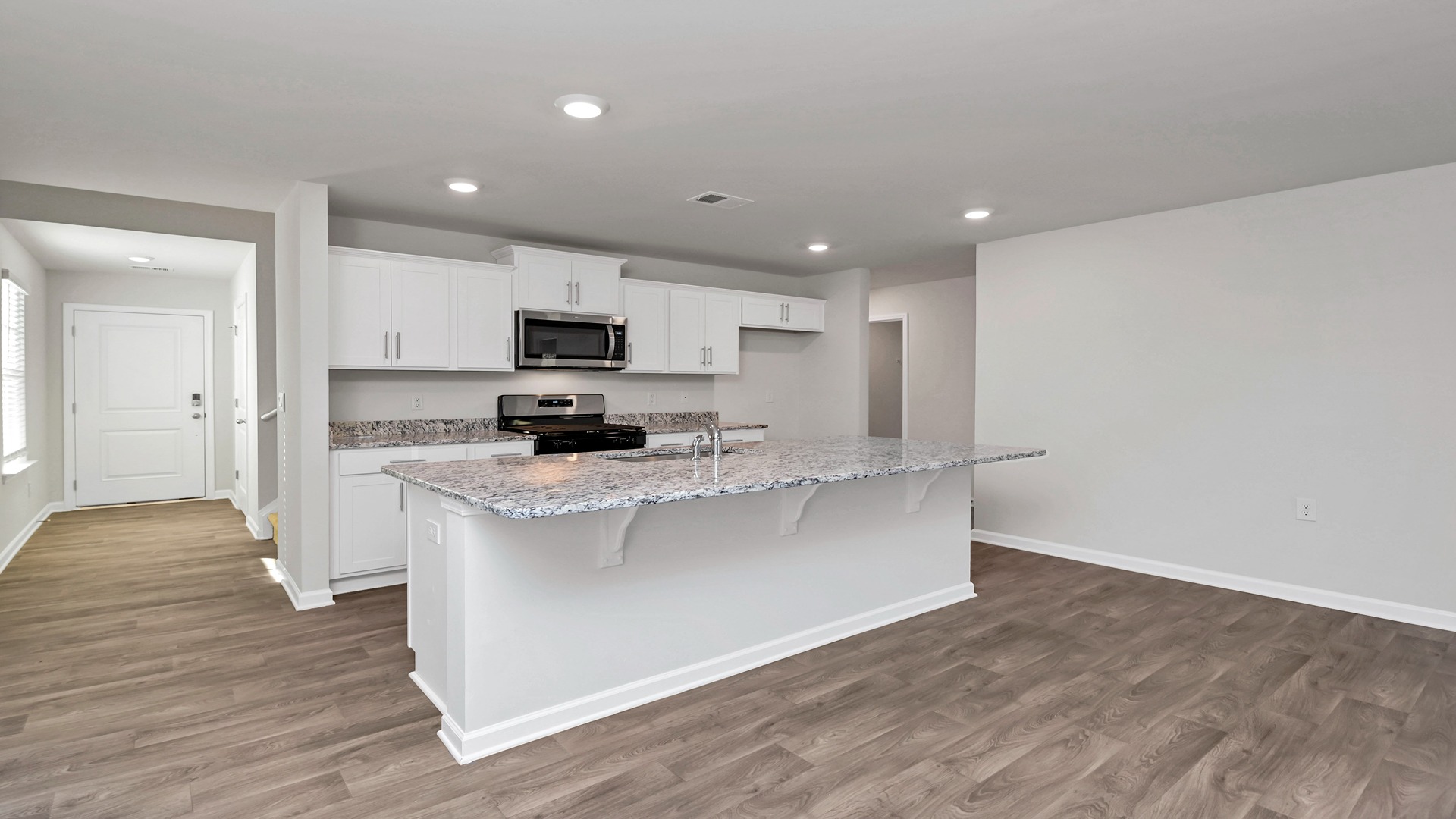 Unfurnished photos - front entrance and kitchen space