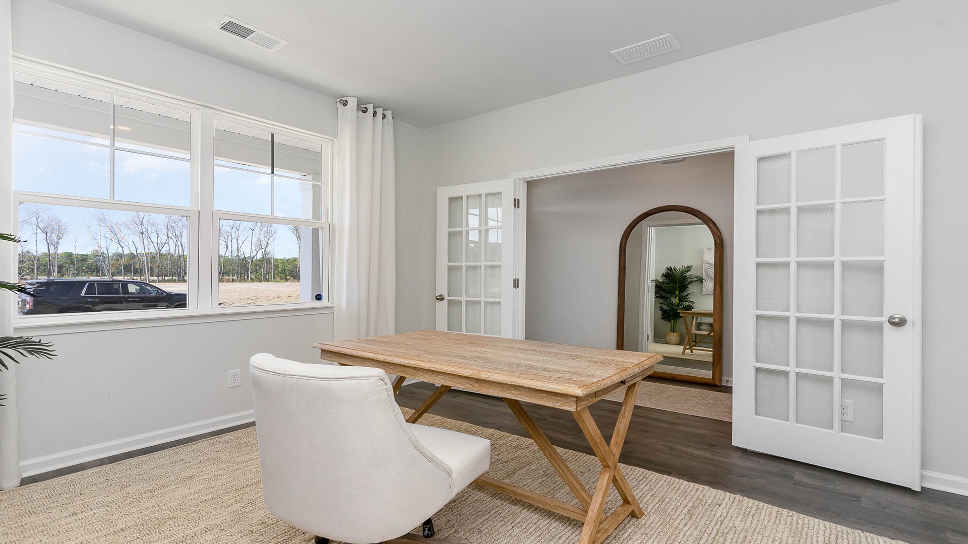 First-floor flex space staged as a home office