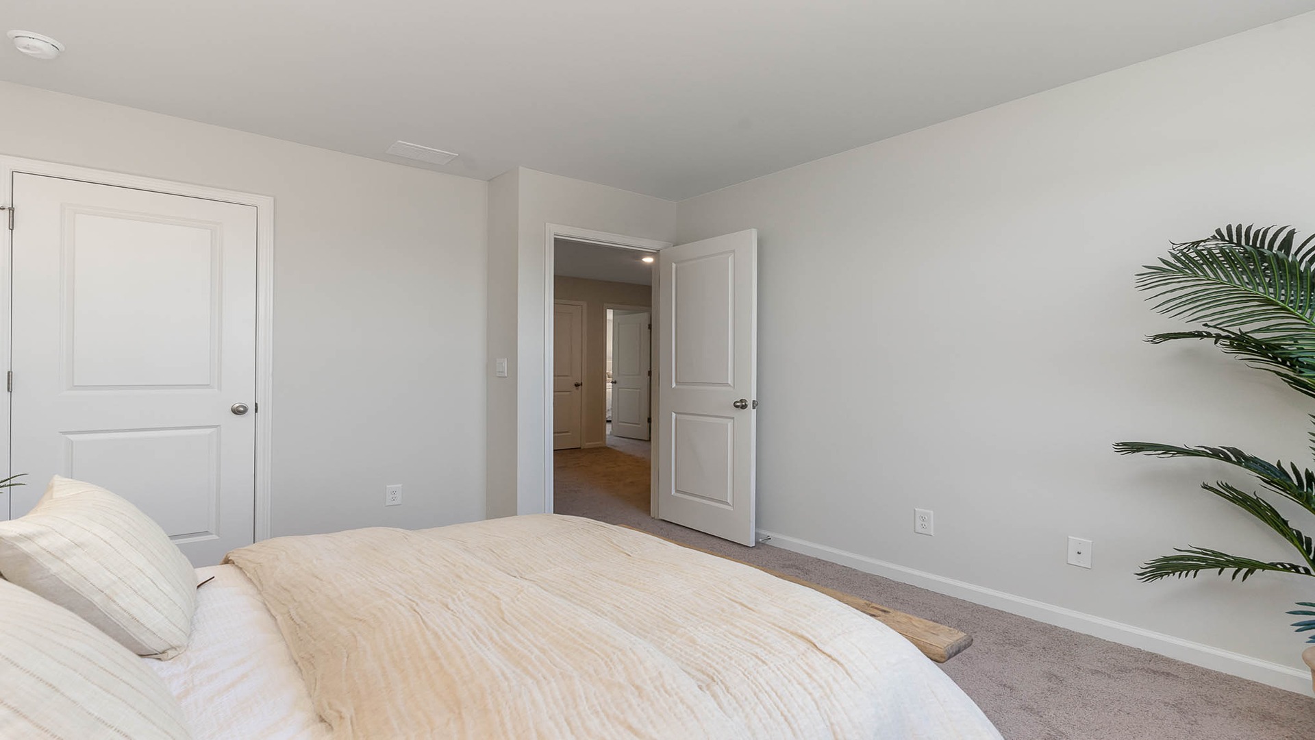 Bedroom 3 with carpet flooring and a window
