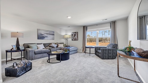 There is a large loft/secondary living space upstairs.