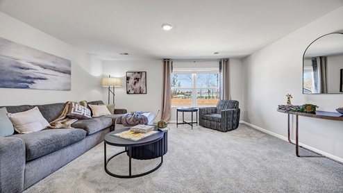 There is a large loft/secondary living space upstairs.