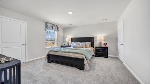 Bedroom 4 is located off the upstairs living space.