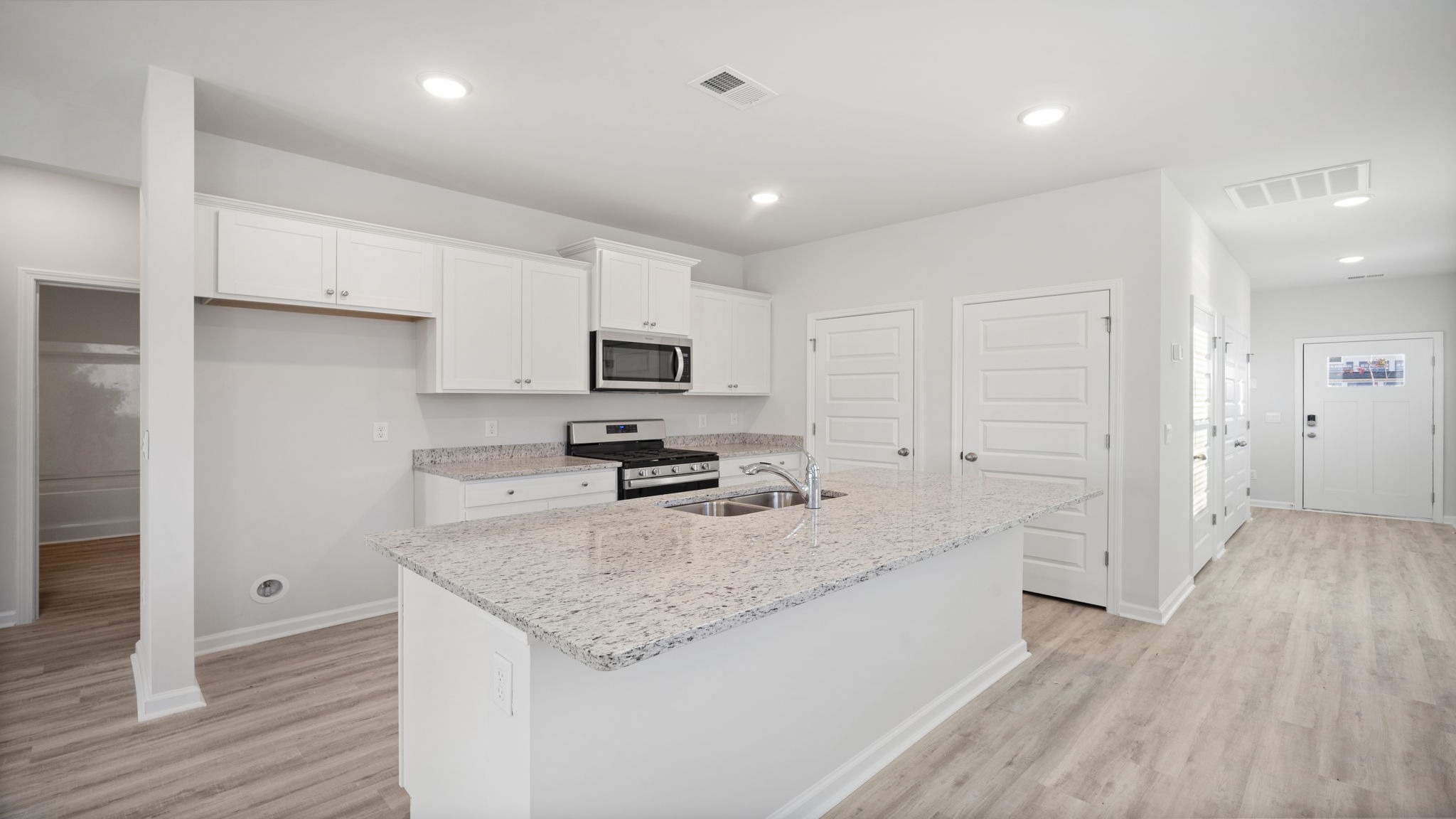 Floating kitchen island with space for barstool seating