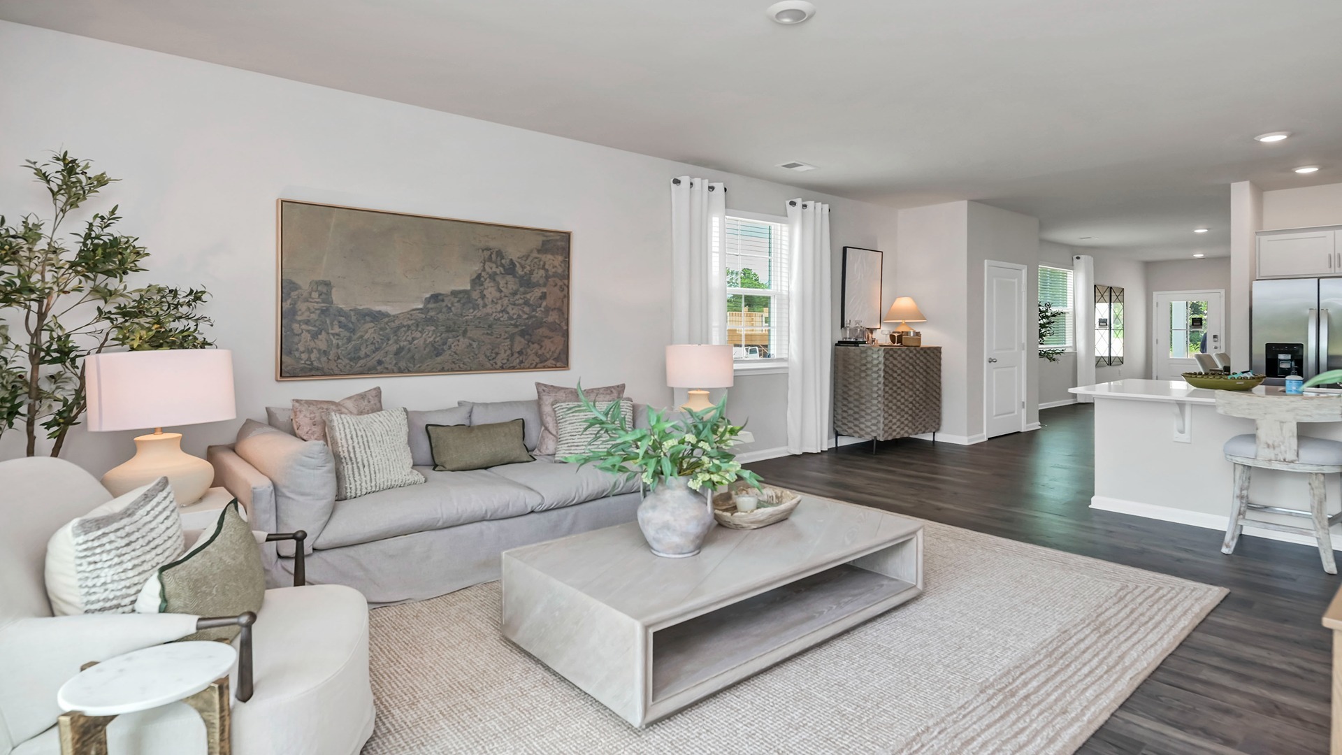 Living area leads into primary bedroom